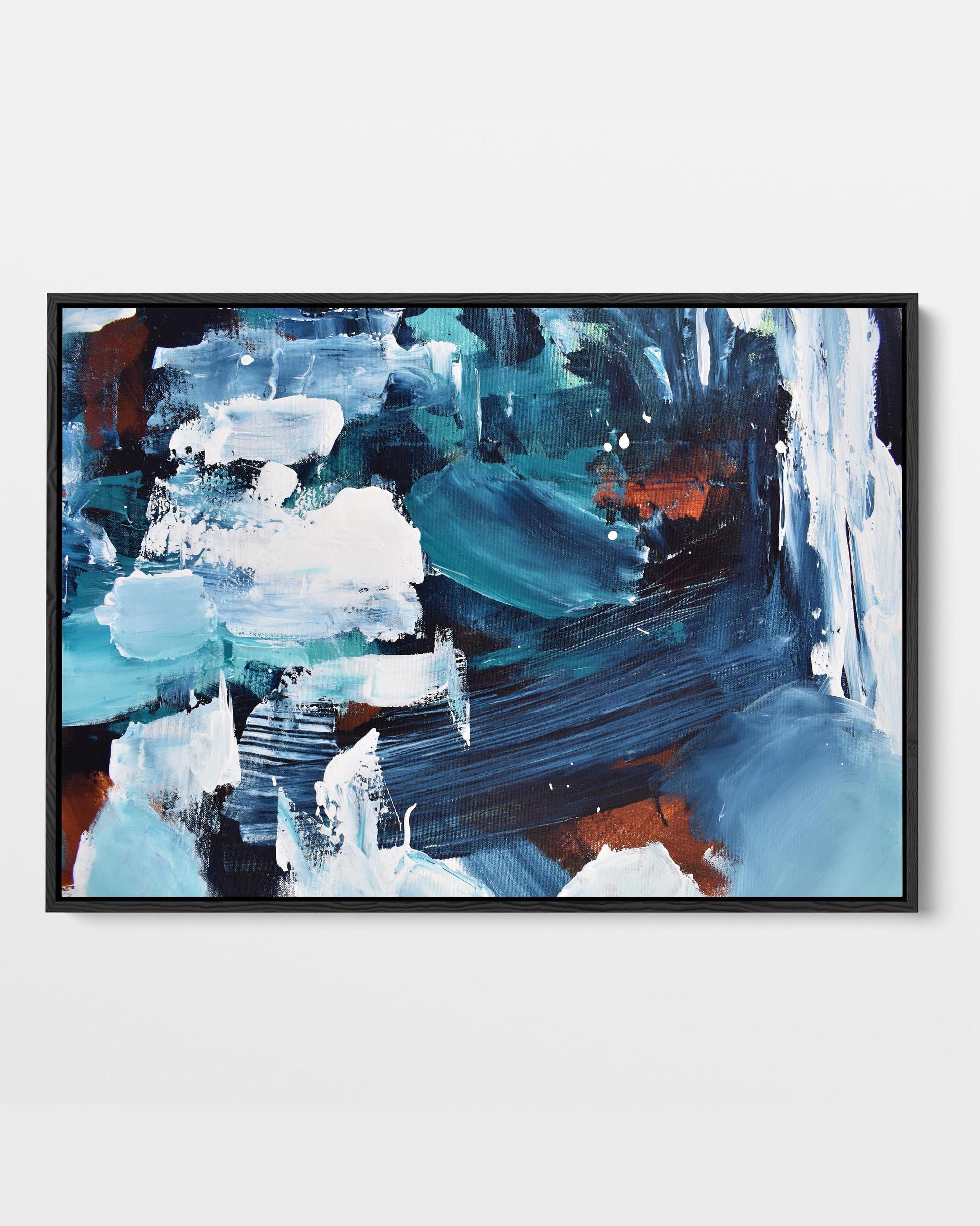A vibrant abstract canvas print featuring modern blue, white, brown, and dark navy tones, framed in either black or white.