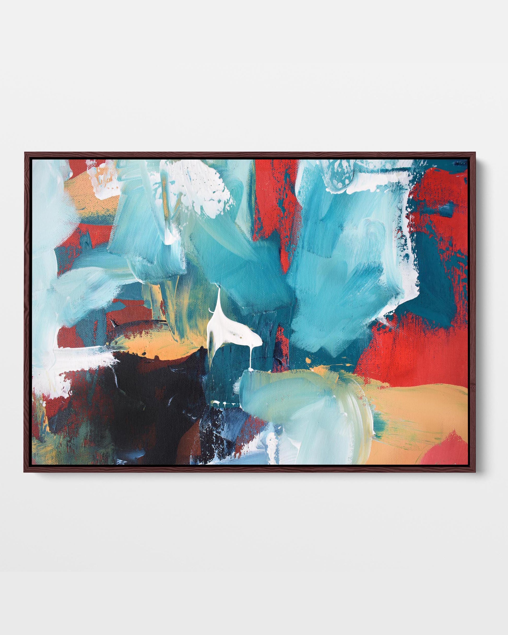 A vibrant abstract canvas print with blue, yellow, red, and black tones, framed in a choice of black or white.