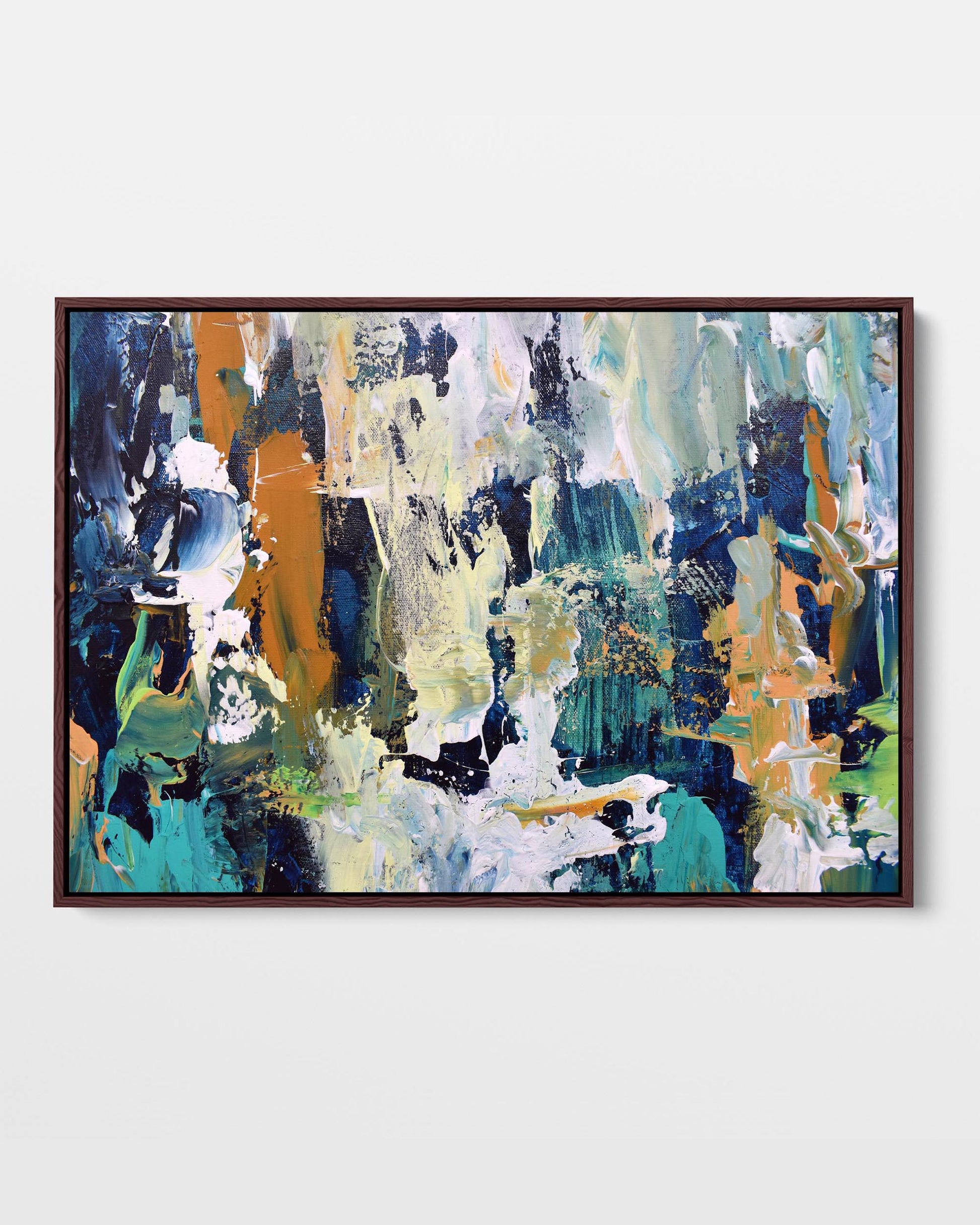 A vibrant abstract canvas painting with a combination of modern teal, blue, and ochre colors, framed in either black or white.