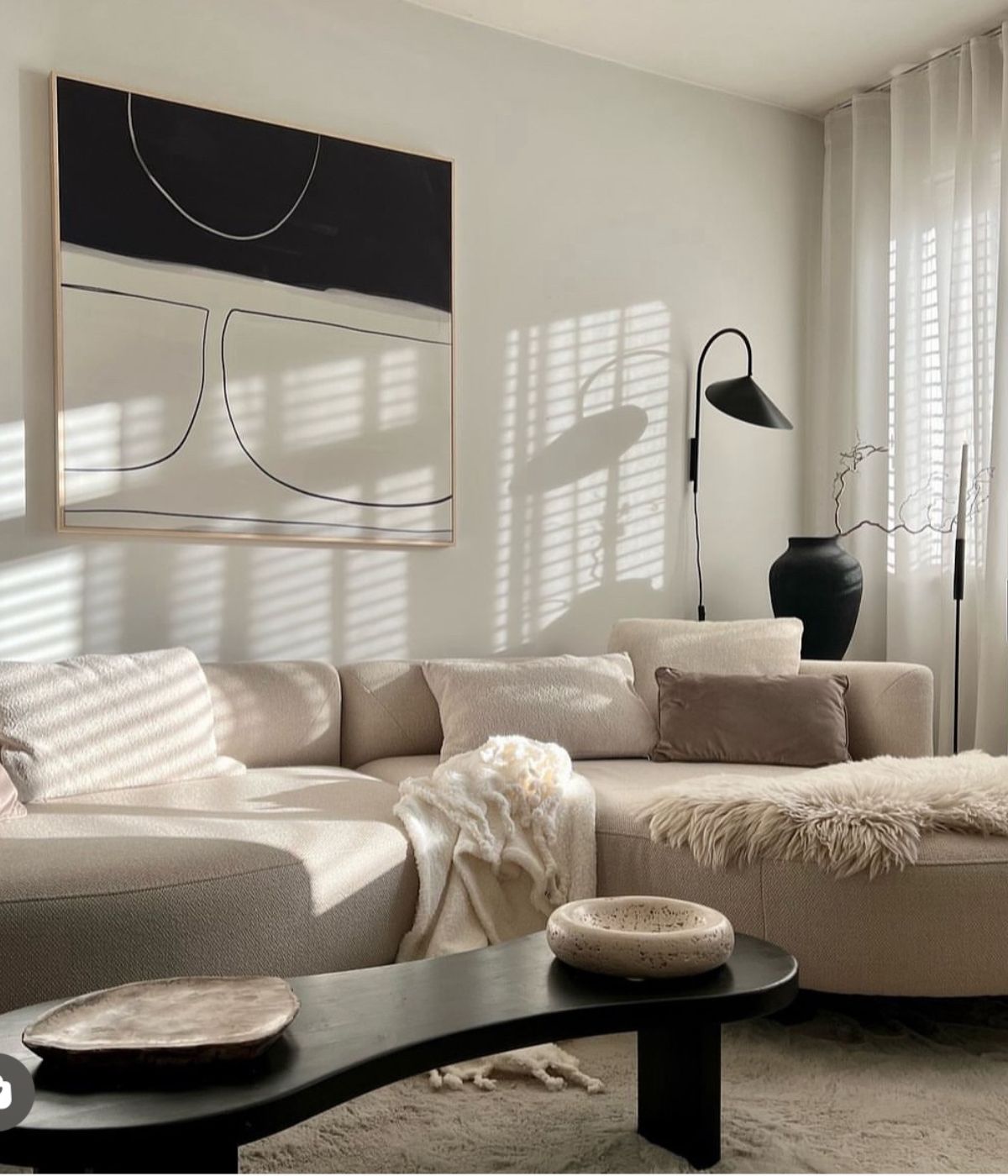 large canvas wall art above sofa in modern living room