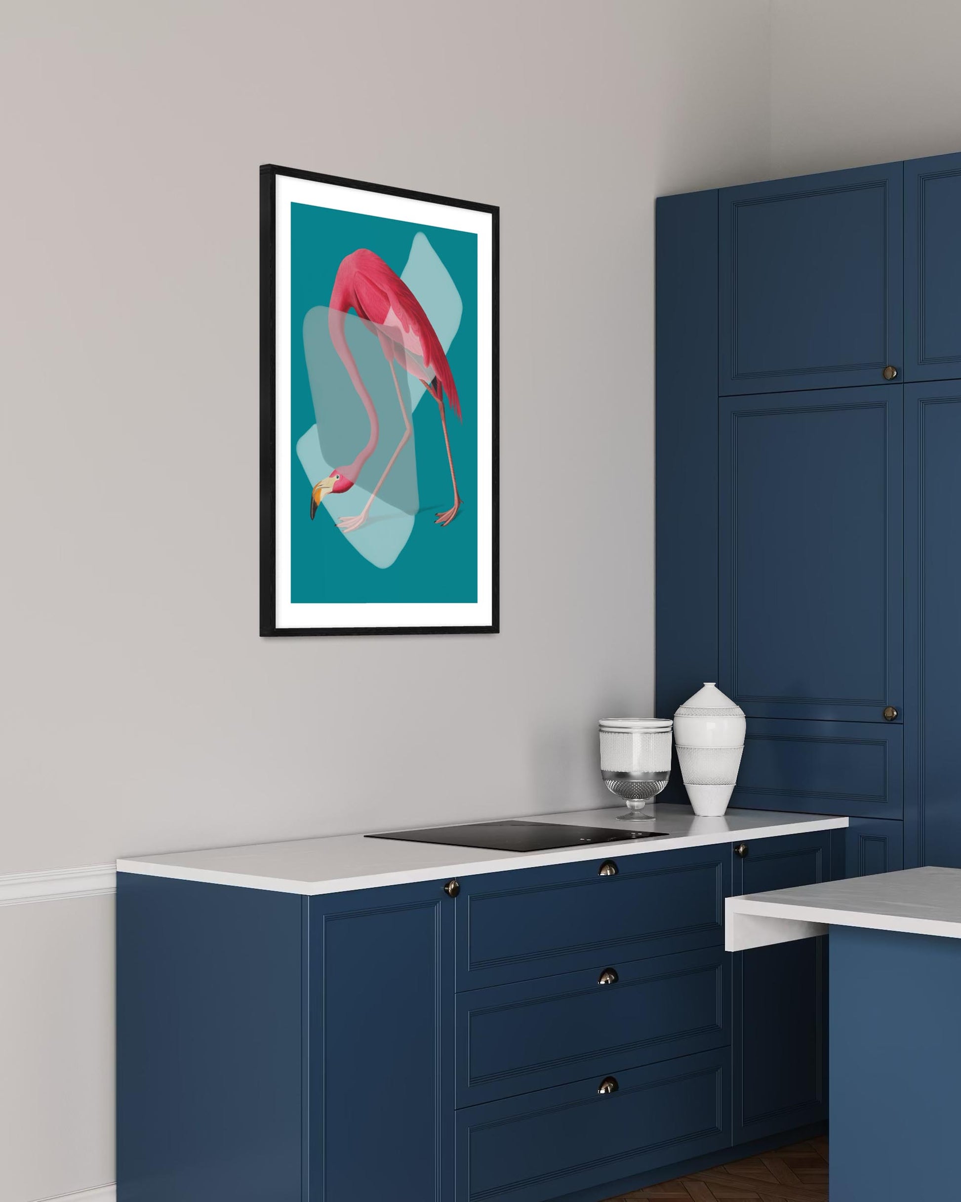 Modern kitchen with blue cabinets, white countertops, and a flamingo artwork on the wall.