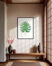 large framed botanical art print in modern room