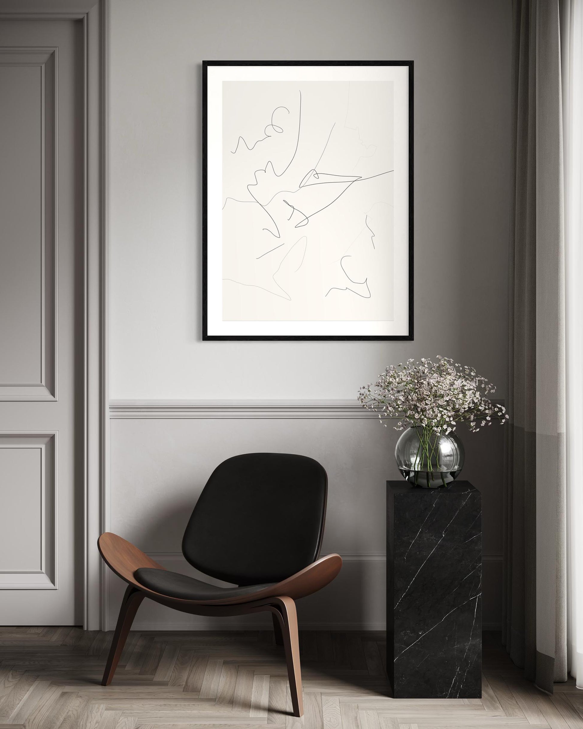 framed abstract line art print on wall in modern living room