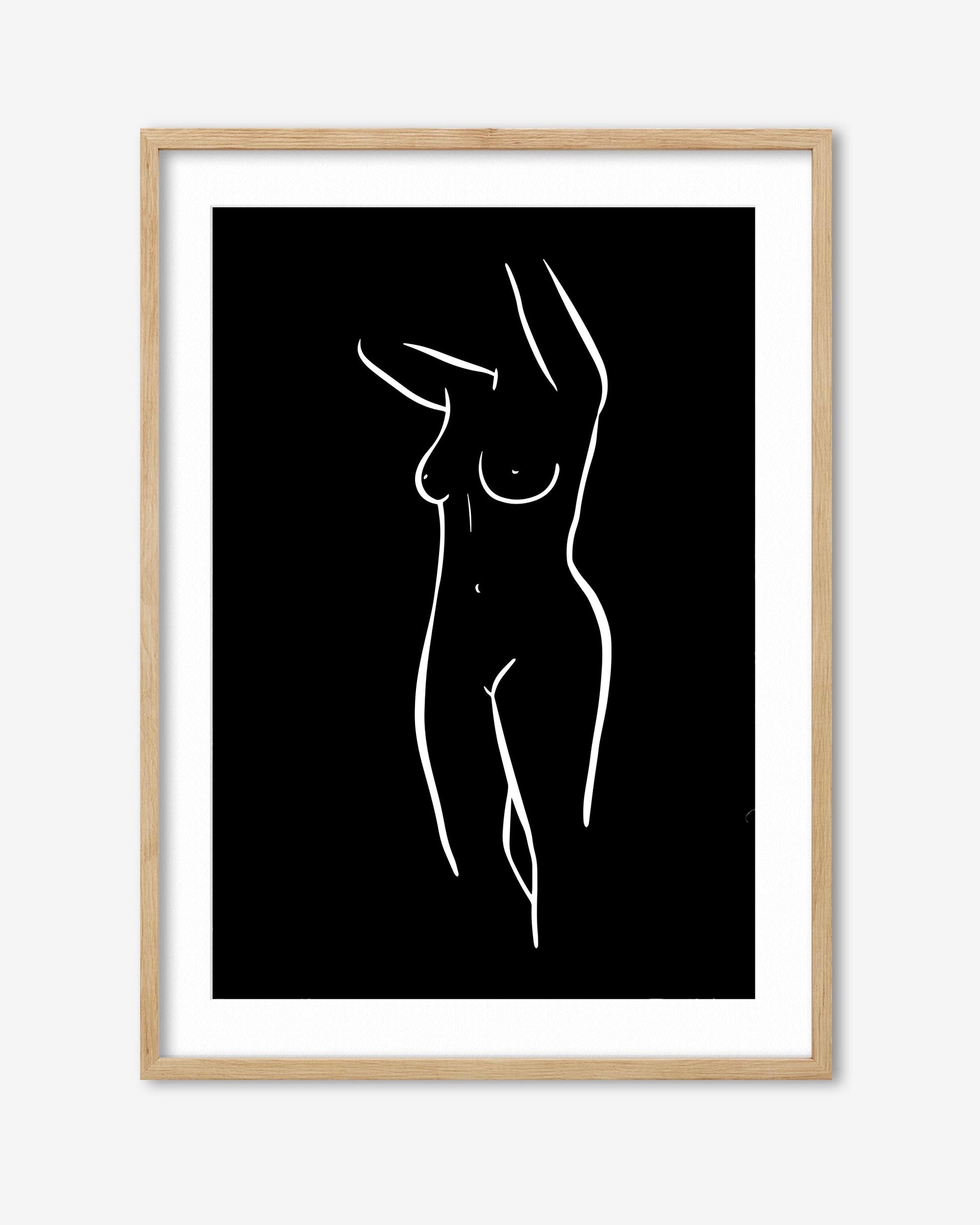 Framed artwork of a minimalistic line drawing of a nude figure on a black background.