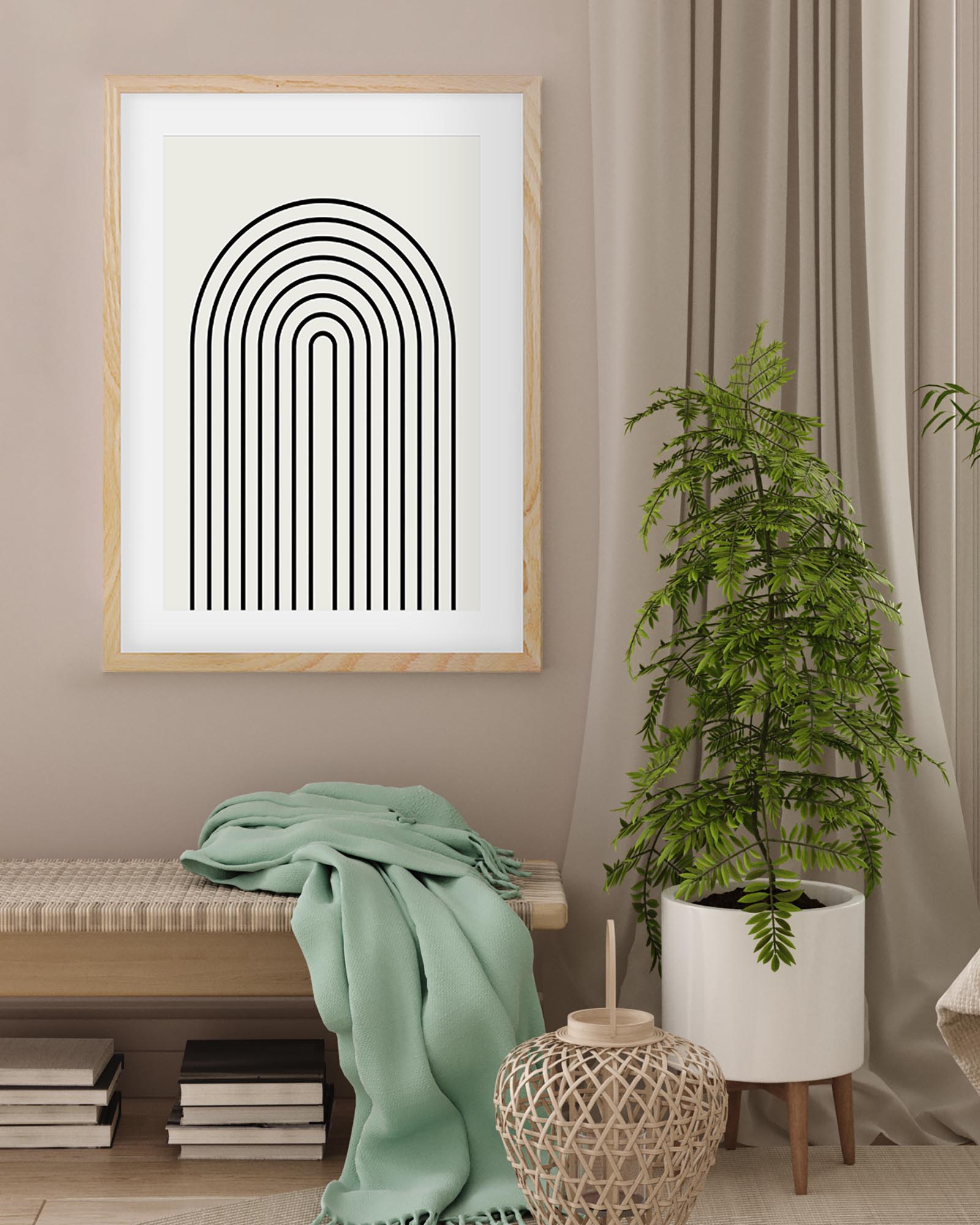 Framed abstract art print on a wall with a plant and books below.