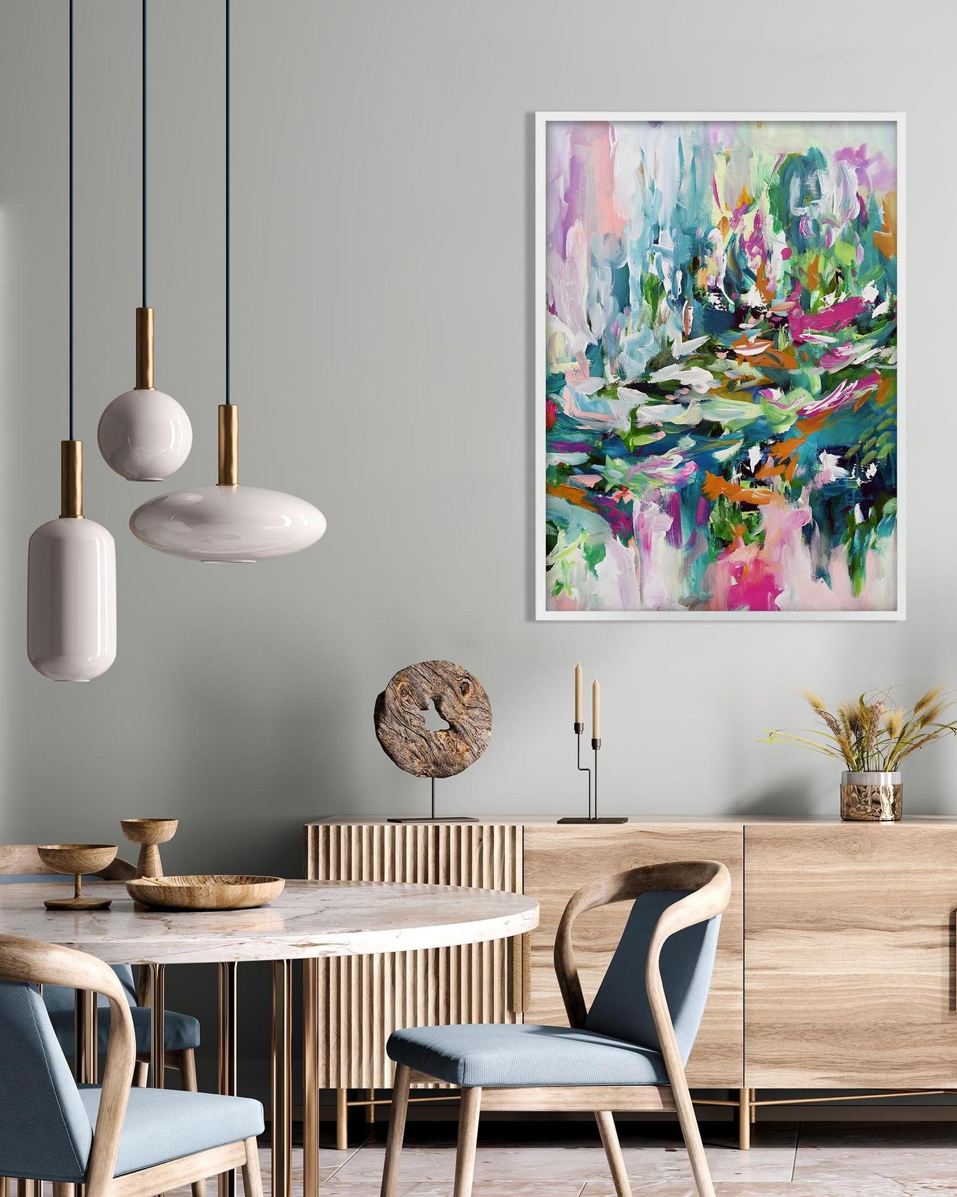 Dining room with a colorful abstract painting on the wall, wooden table, chairs, and decor items.