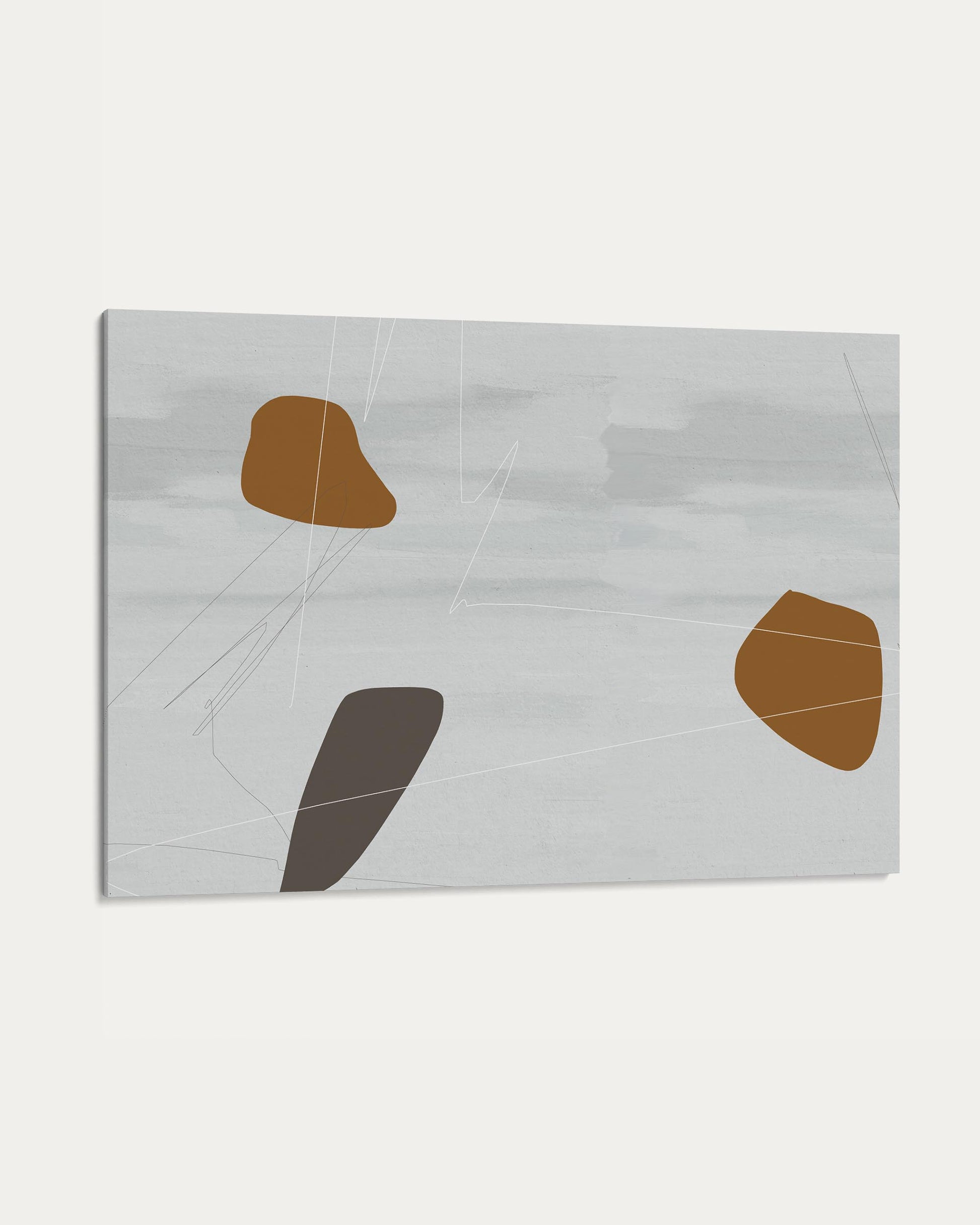 Abstract art piece with brown and gray shapes on a light gray background