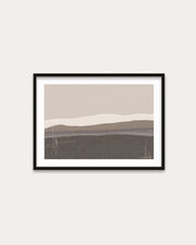 Framed abstract landscape art print on a white wall
