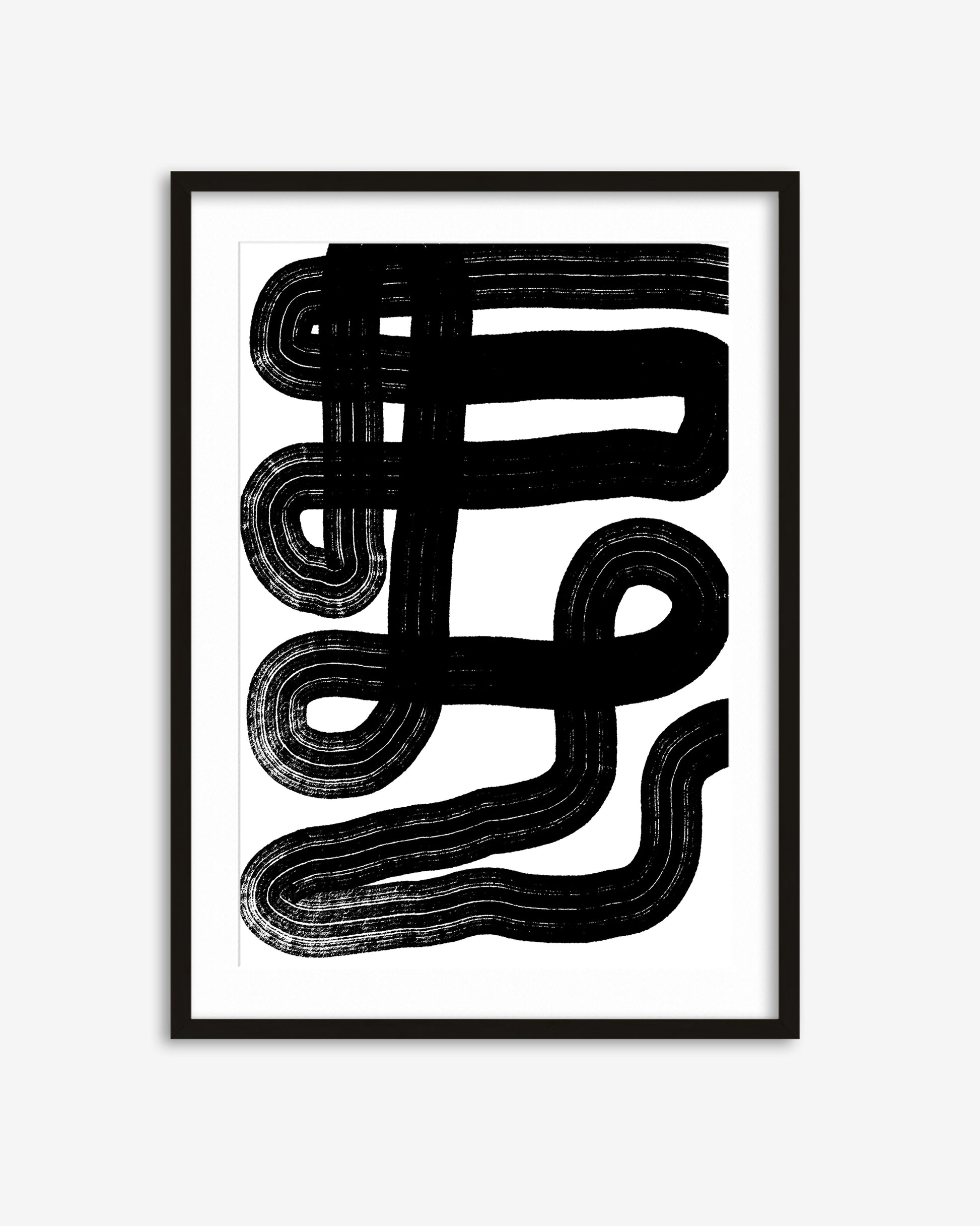 Framed abstract black and white artwork on a white background