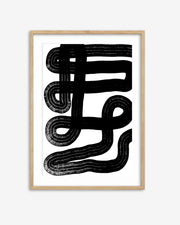 Framed abstract black and white artwork on a white background