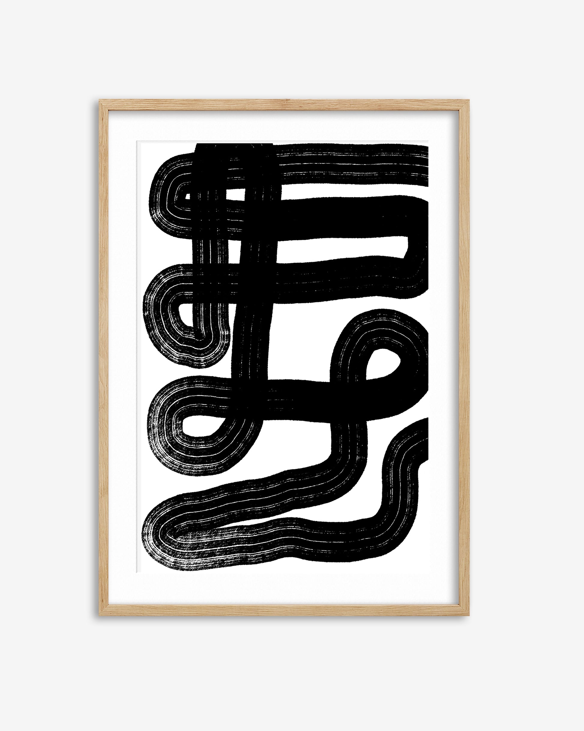 Framed abstract black and white artwork on a white background