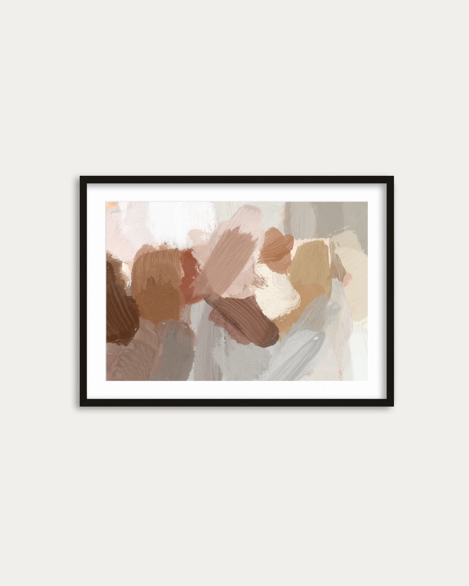 Framed abstract art print on a white wall