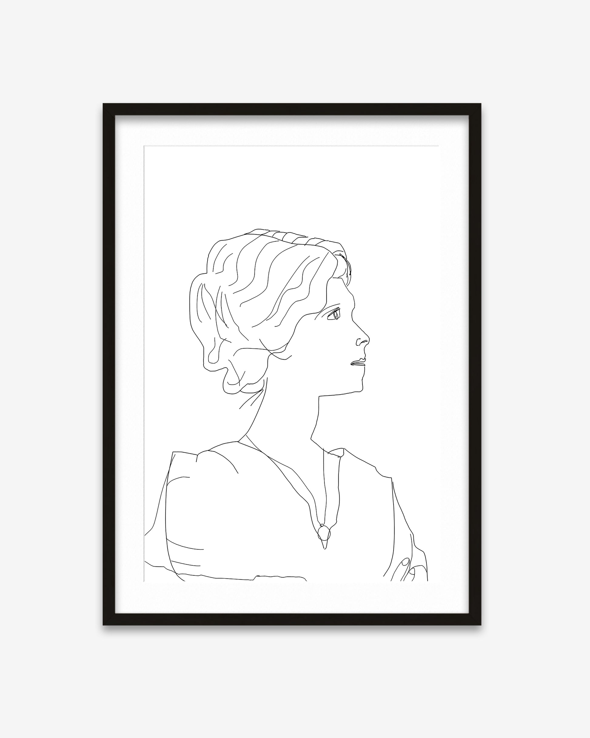 Framed line art of a woman's profile on a white background