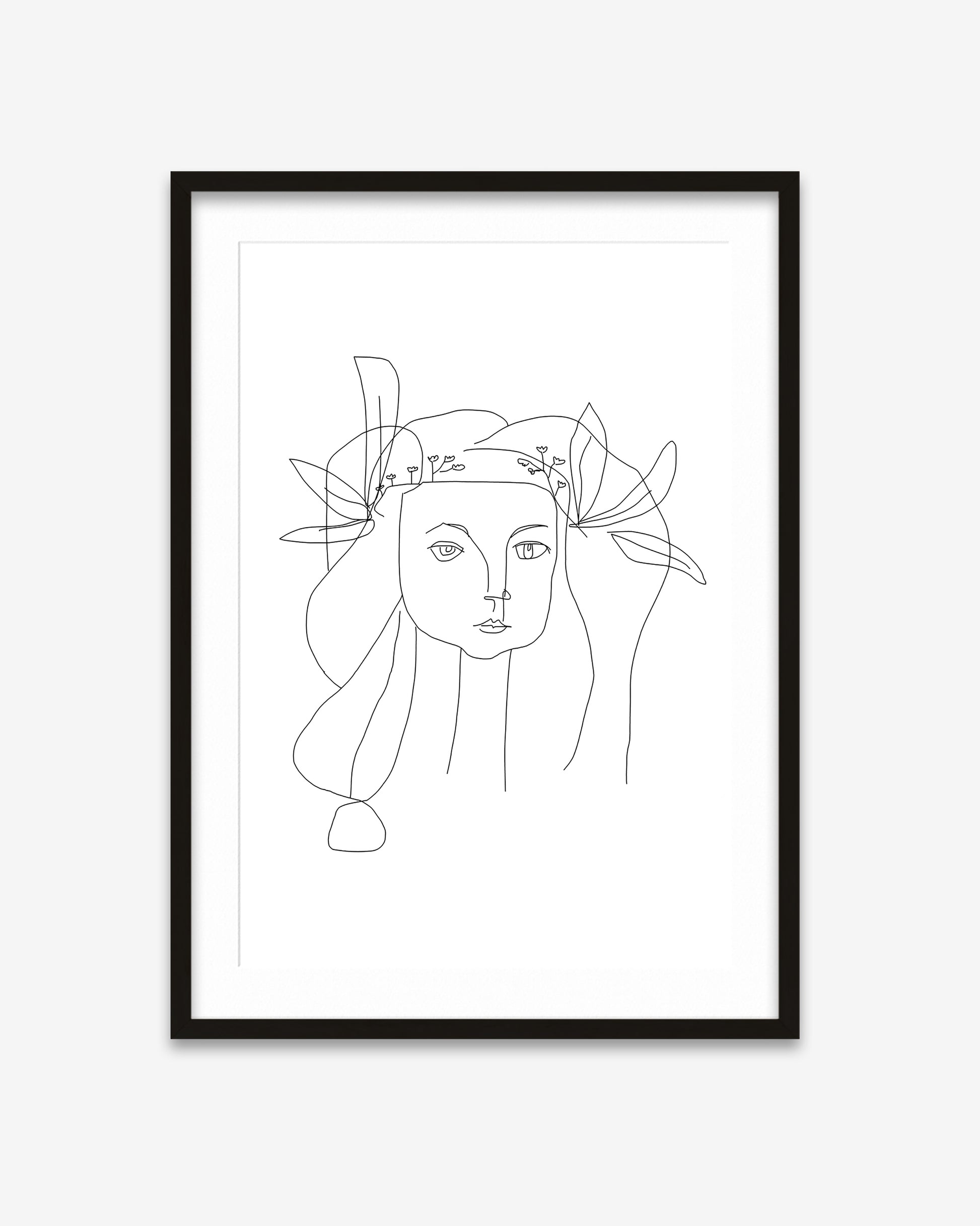 Framed line art of a woman's face with a floral crown on a white background