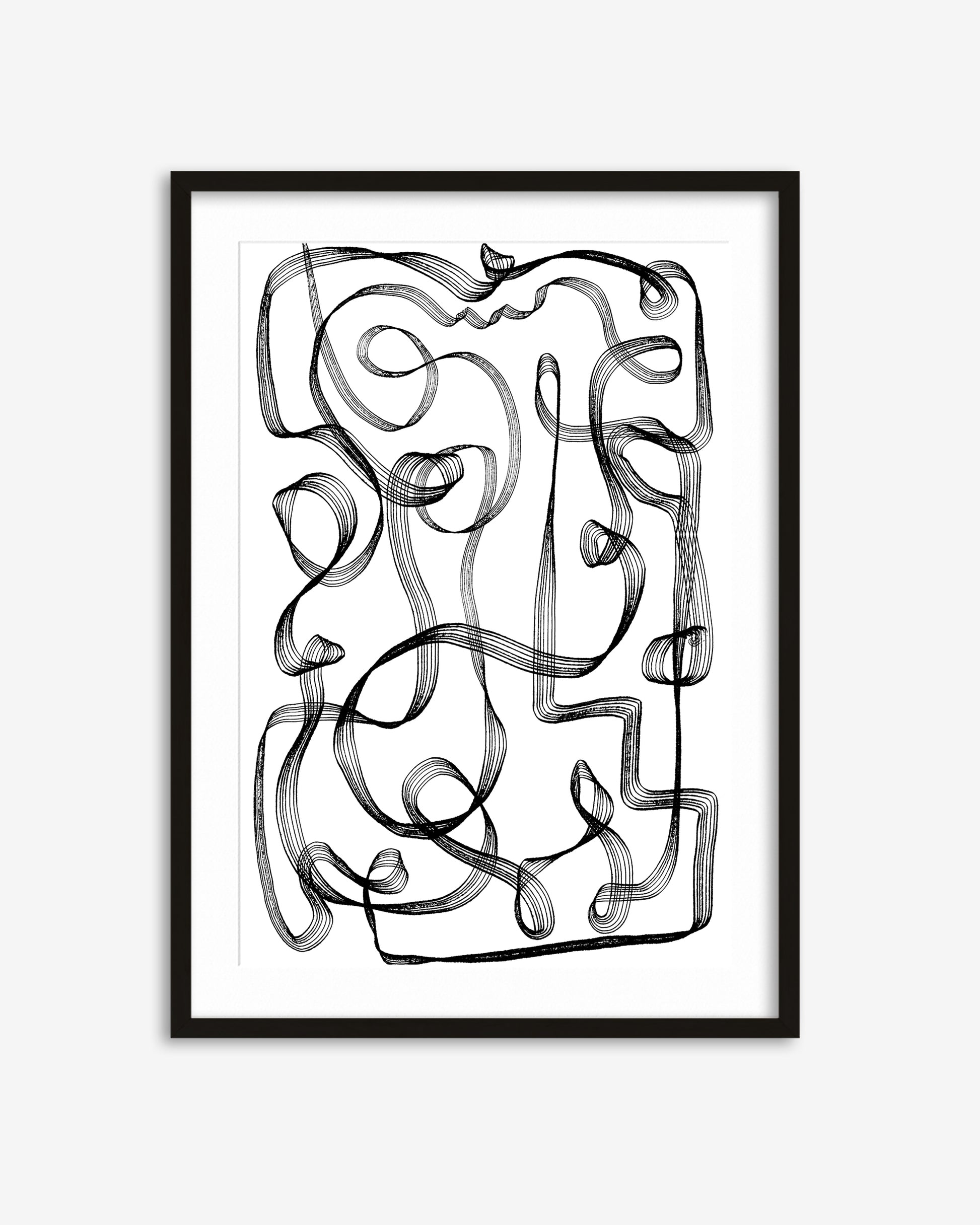 Framed abstract black and white artwork on a white background