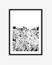 Framed abstract art print with black and white pattern on a light gray background