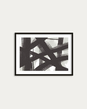 Framed abstract art print with black and white brush strokes on a light gray background