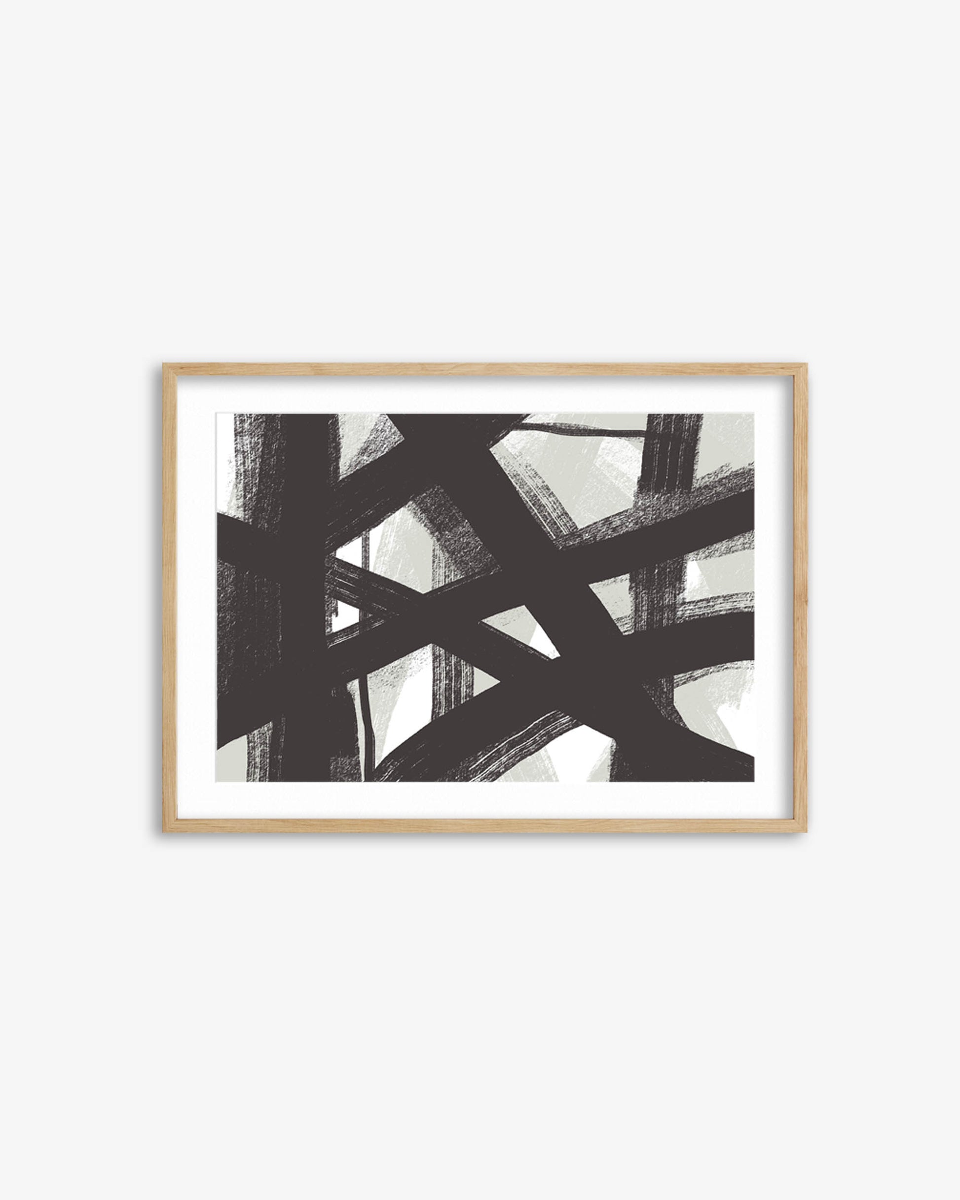 Framed abstract art print with black and white brush strokes on a light gray background