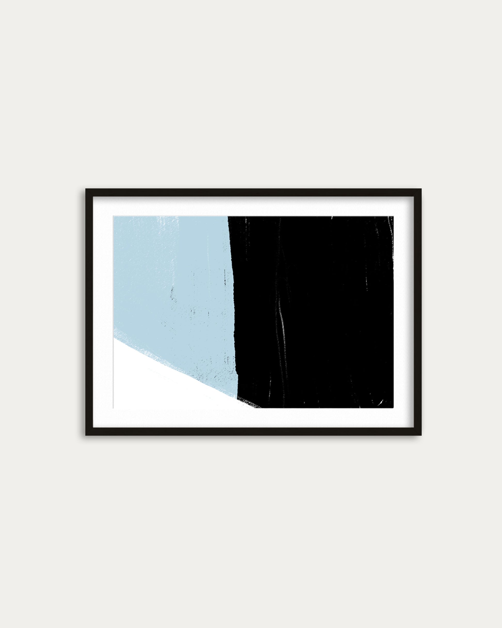 Framed abstract art print with blue, black, and white colors on a light gray background
