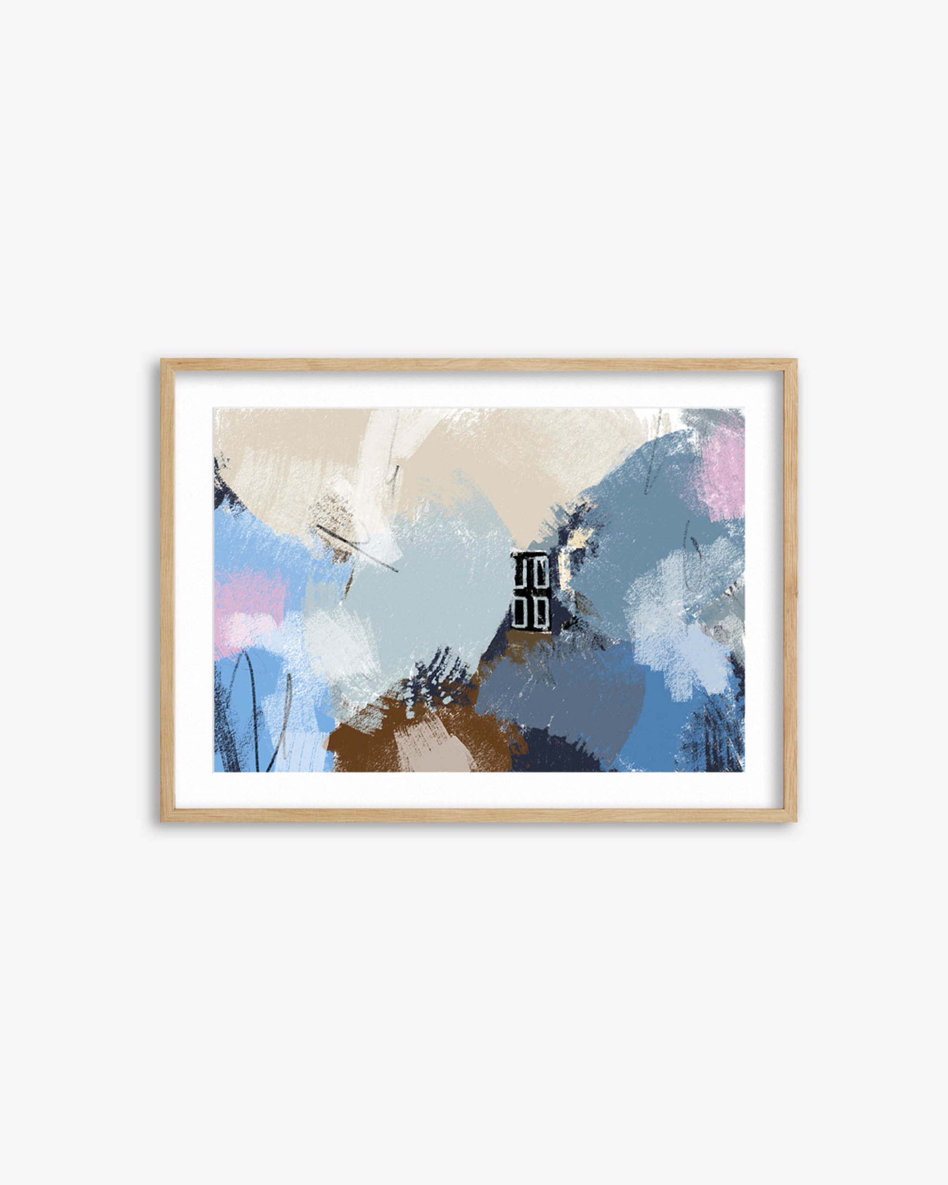 Framed abstract art print with colorful brush strokes on a white wall