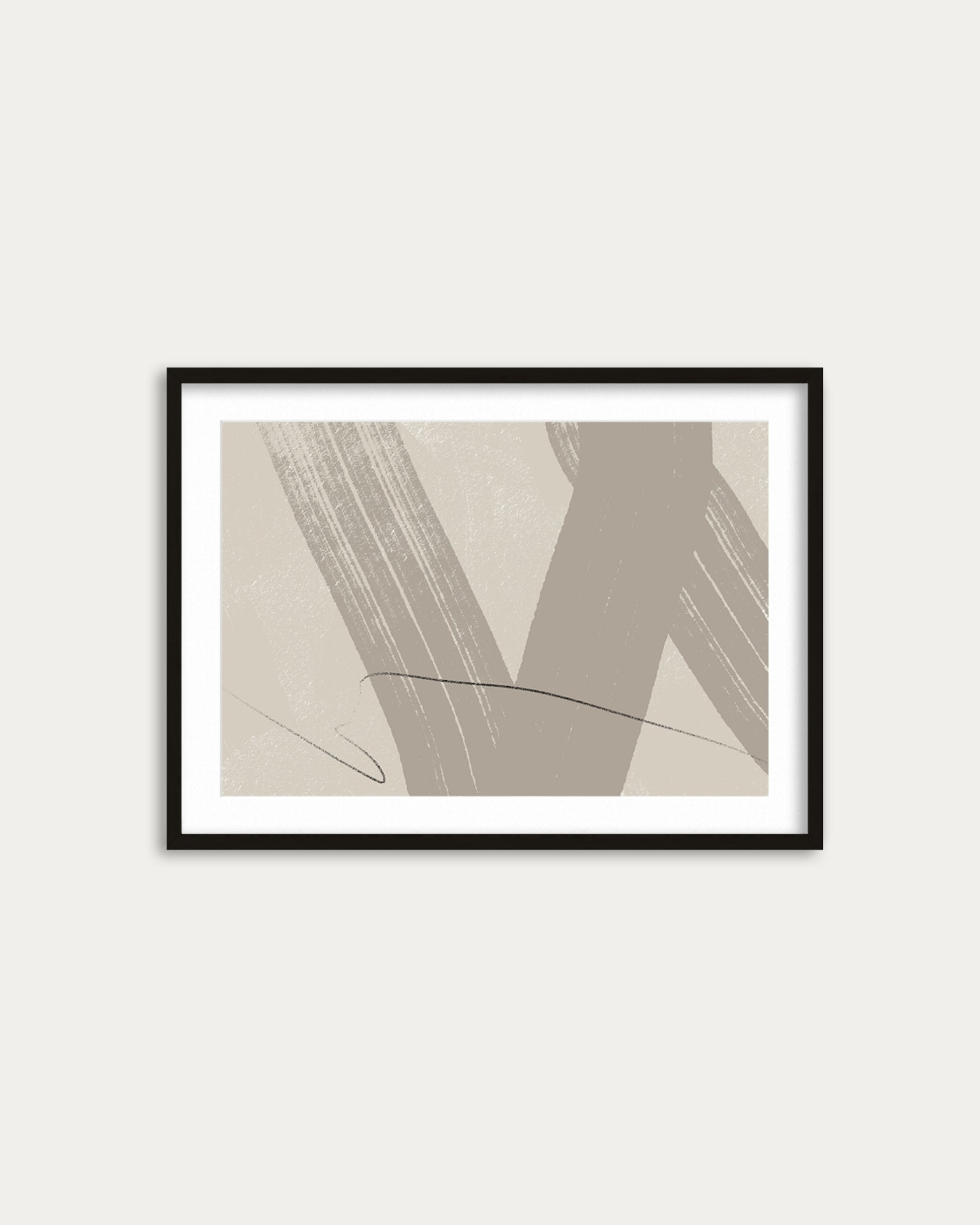 Framed abstract art print on a white wall