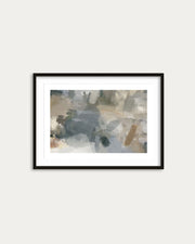 Framed abstract art print on a white wall