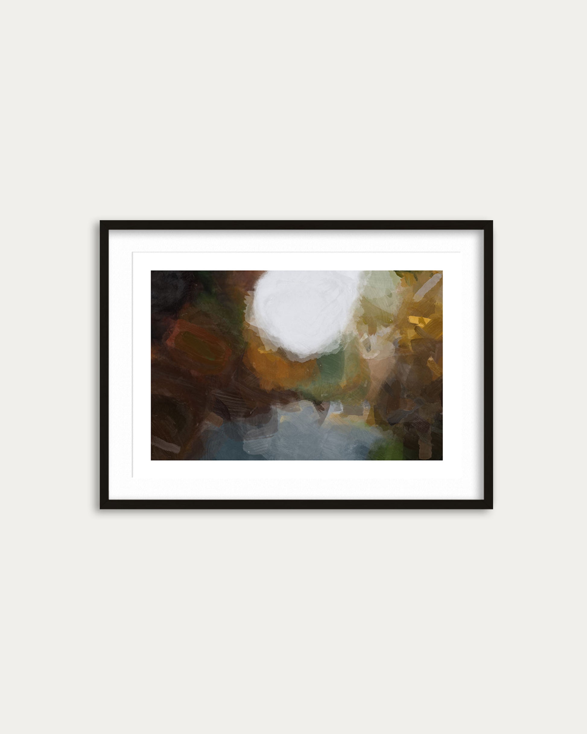 Framed abstract art print on a white wall