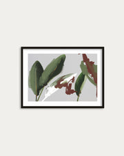 Framed artwork with green and red leaves on a light gray background