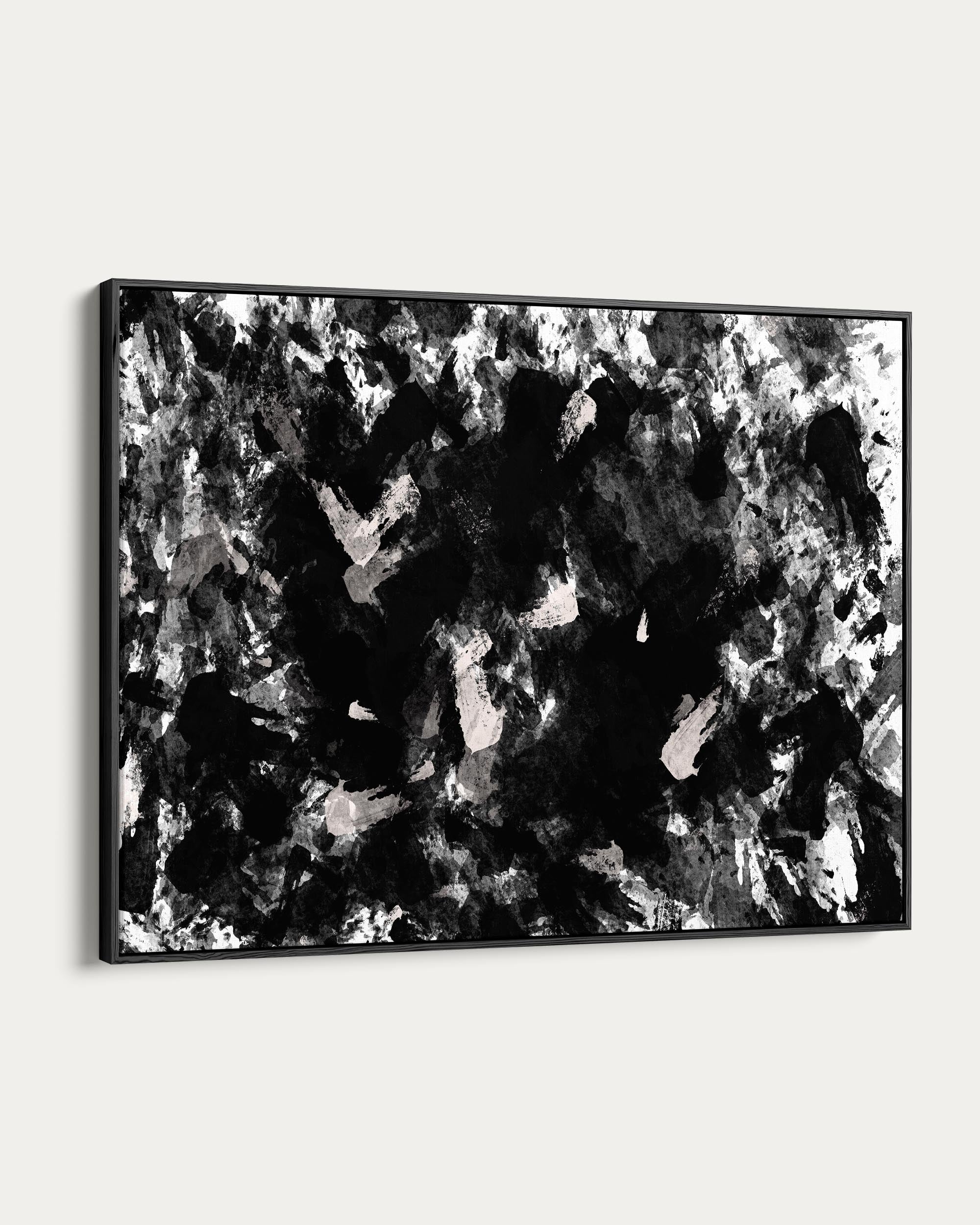 Framed abstract art with black and white patterns on a white background