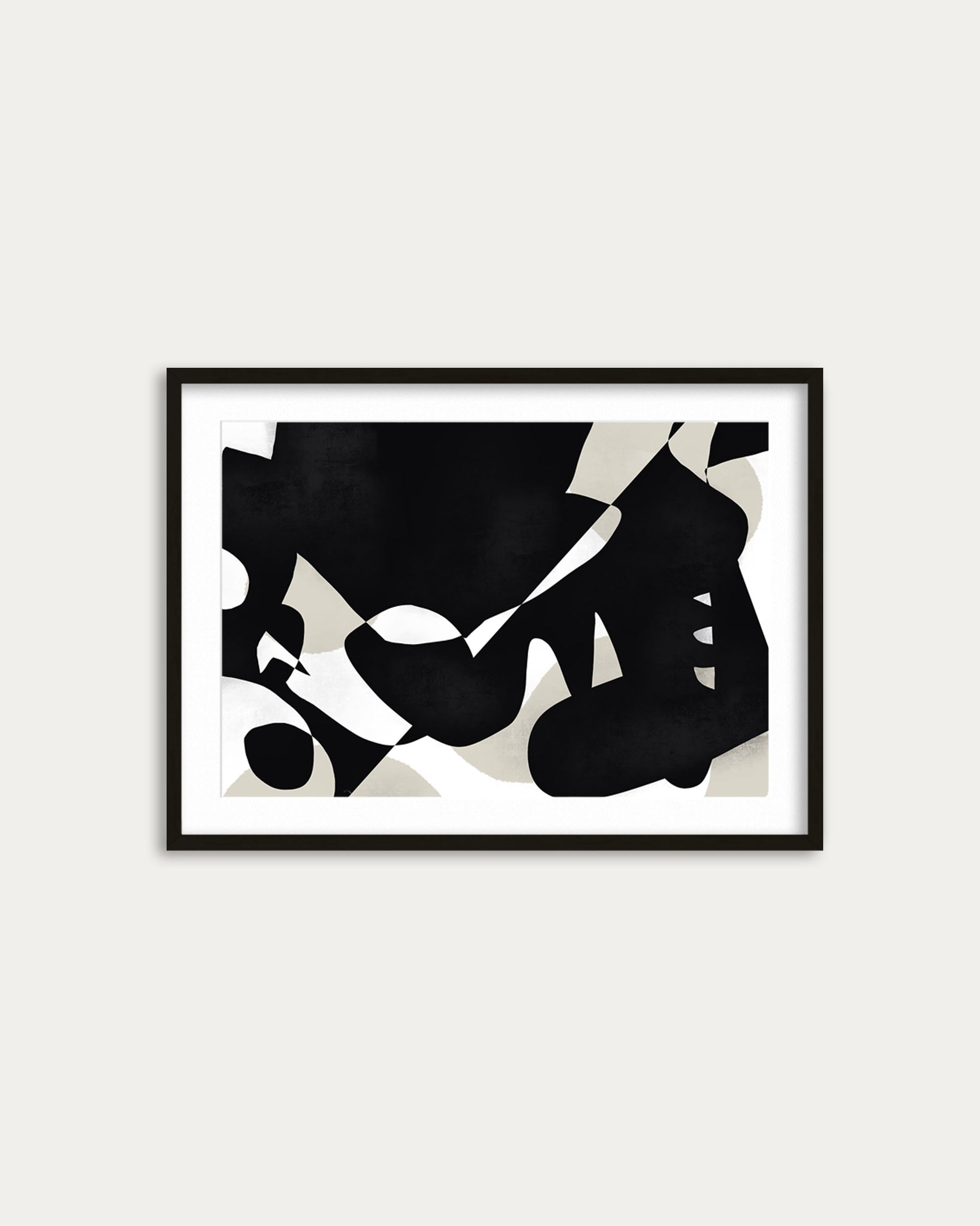 Framed abstract art print with black and white shapes on a light gray background