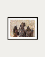 Framed abstract art piece on a white wall