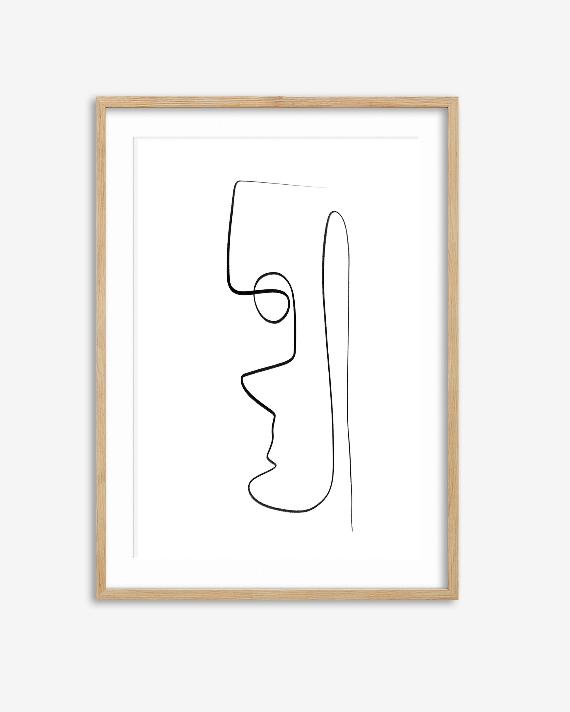 Framed abstract line art of a face on a white background