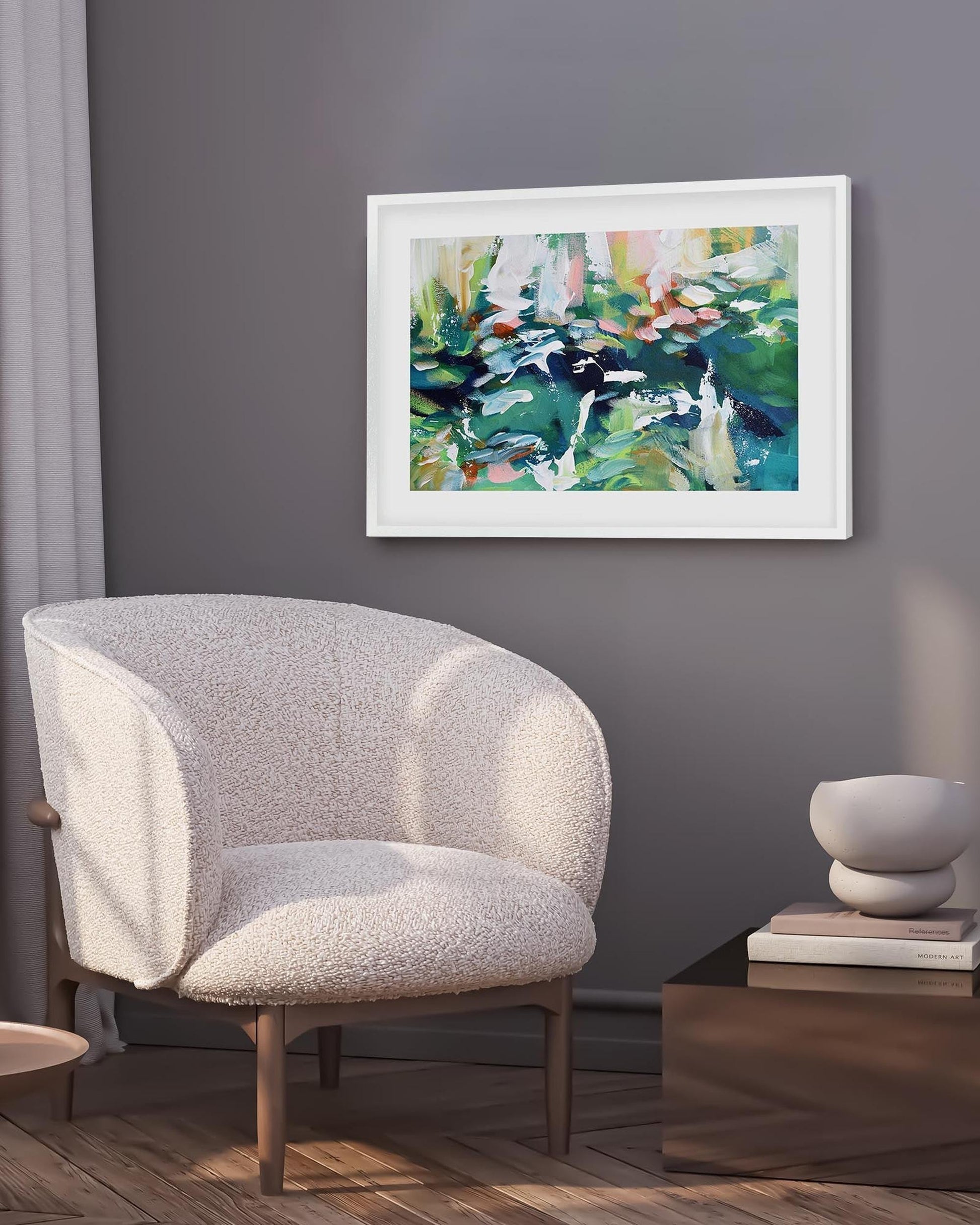 Decorative armchair in a room with a framed abstract painting on the wall.