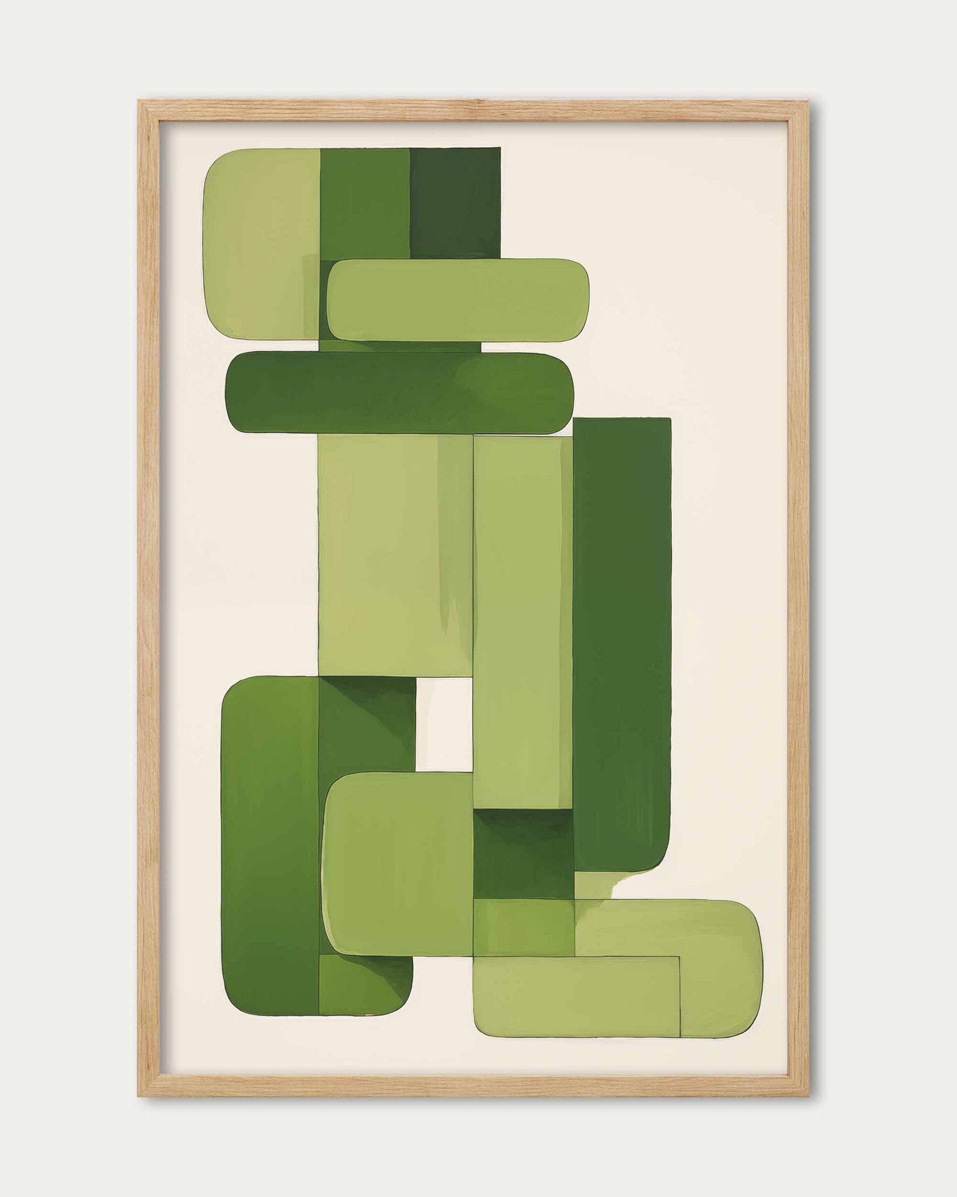 Framed abstract art piece with green shapes on a beige background
