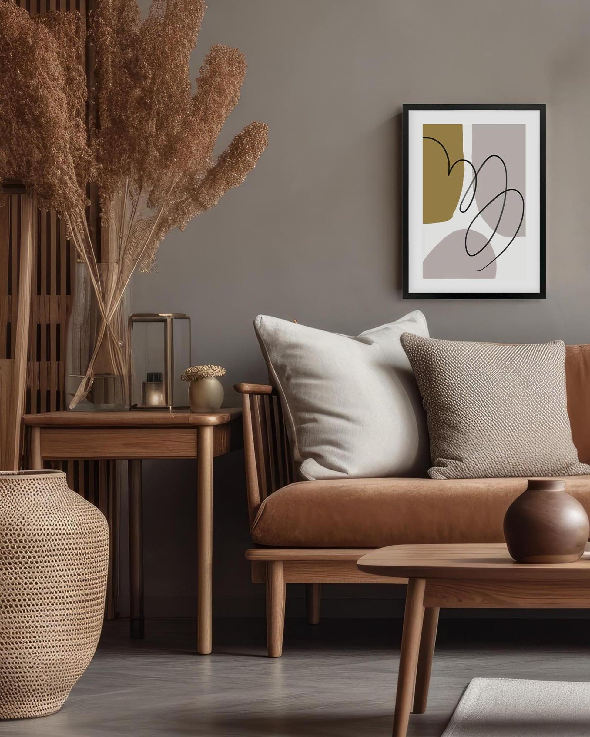 Cozy living room with brown sofa, wooden coffee table, and abstract art on wall.