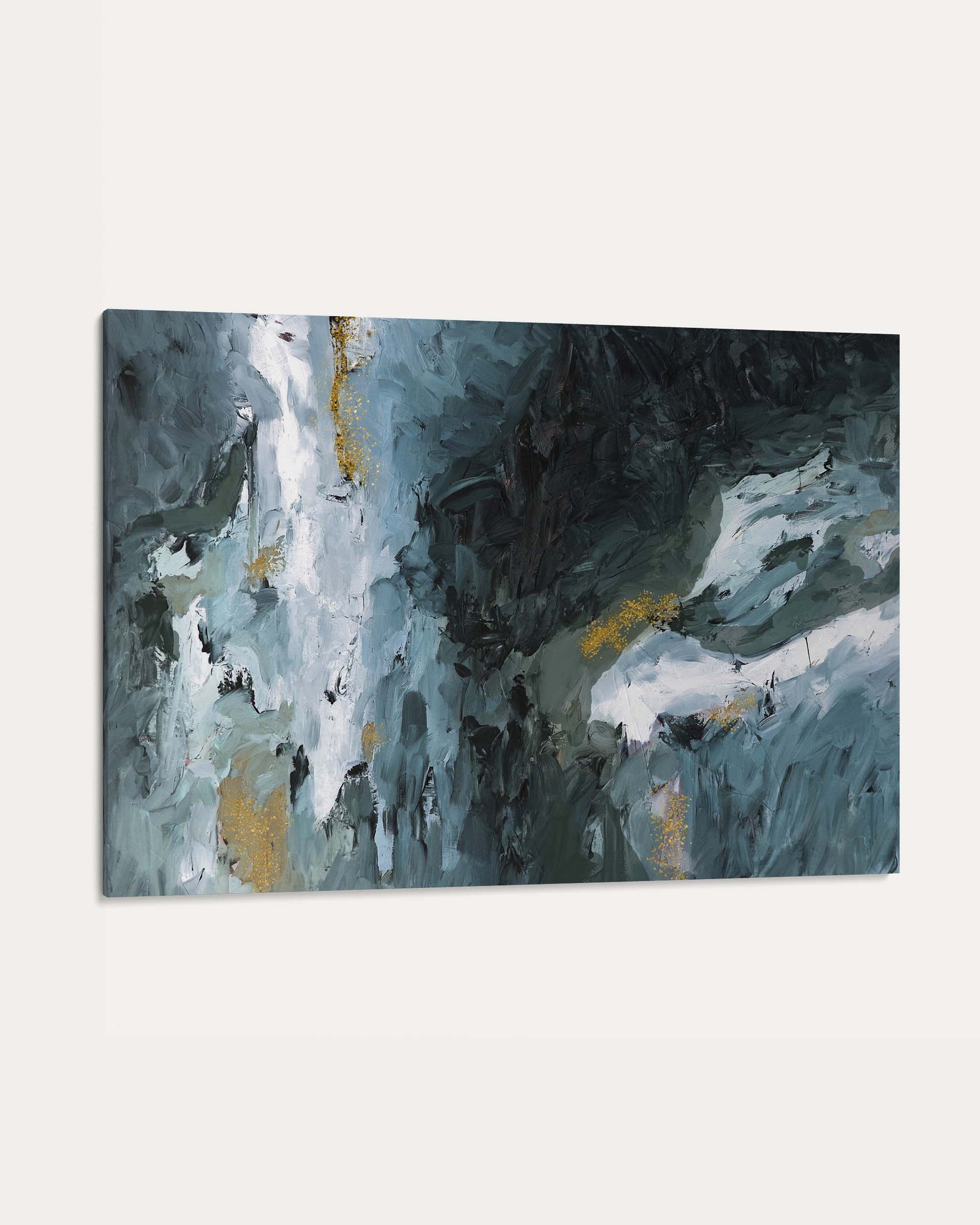 Abstract painting with shades of gray, white, and gold on a white background