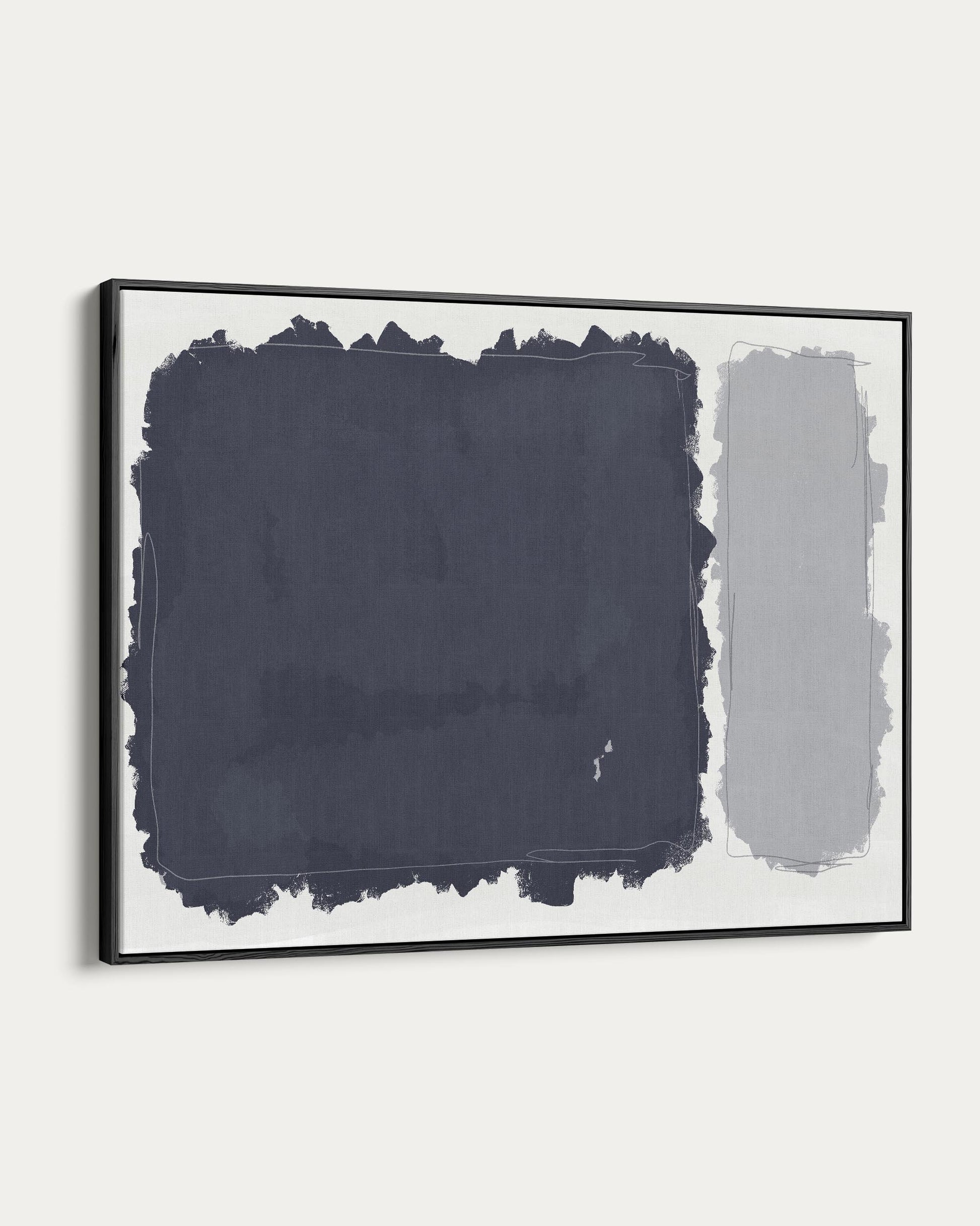 Framed abstract art with dark blue and gray brushstrokes on a white background