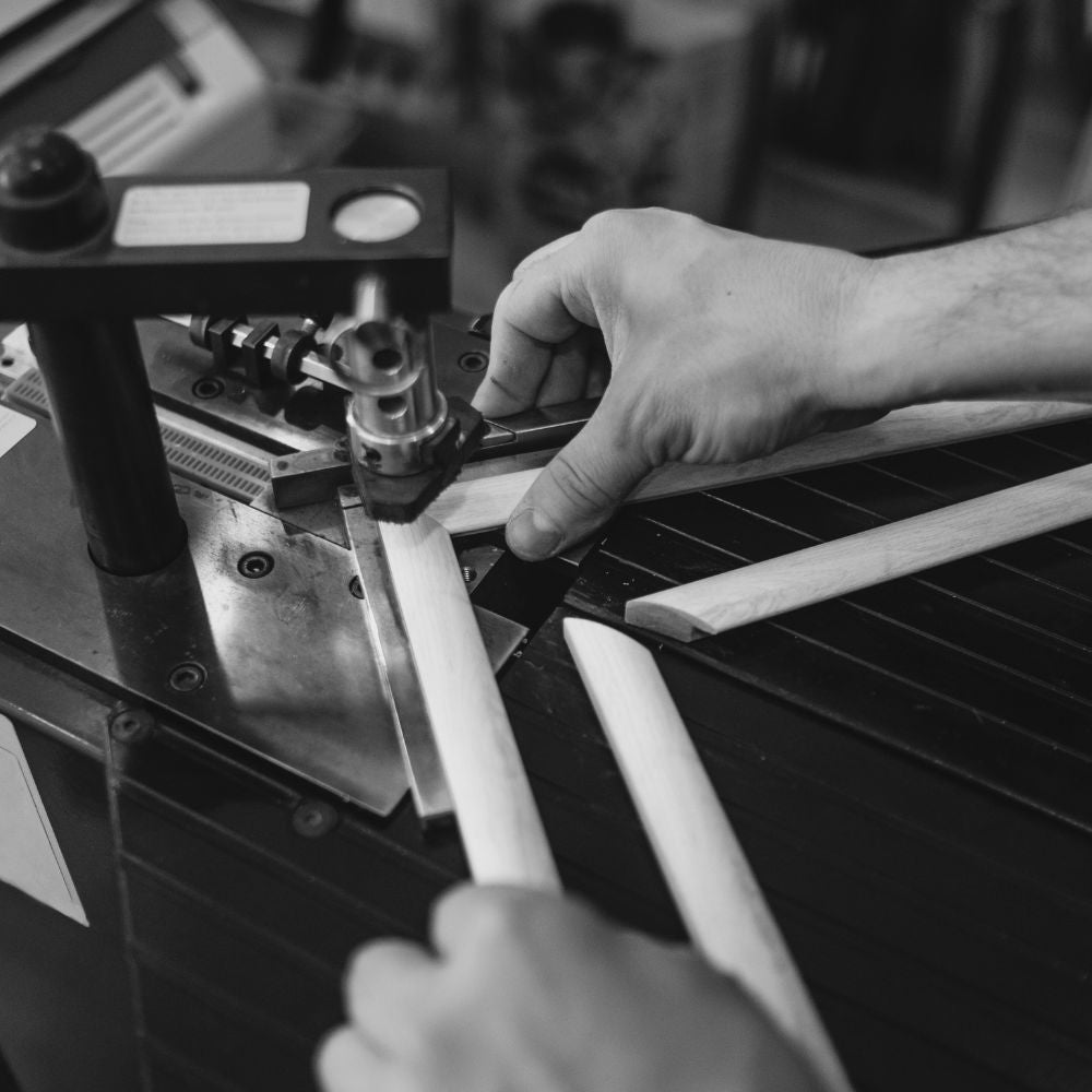 professional framer making a wooden picture frame