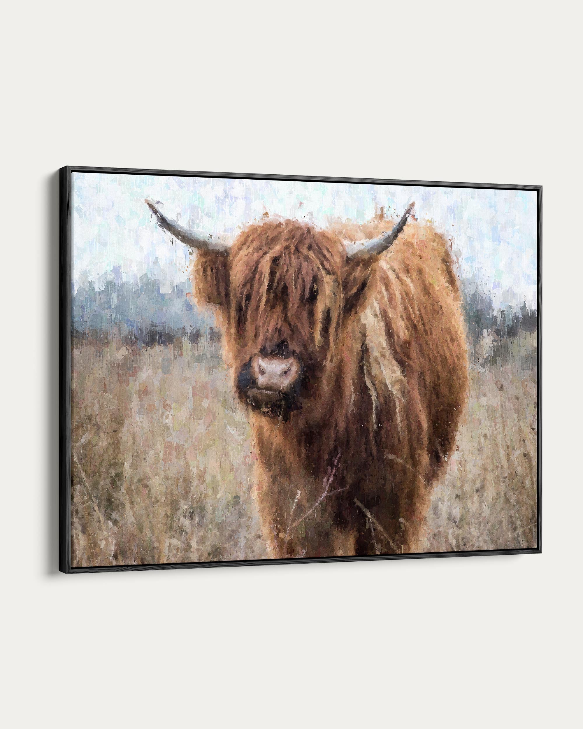 Framed artwork of a highland cow in a field