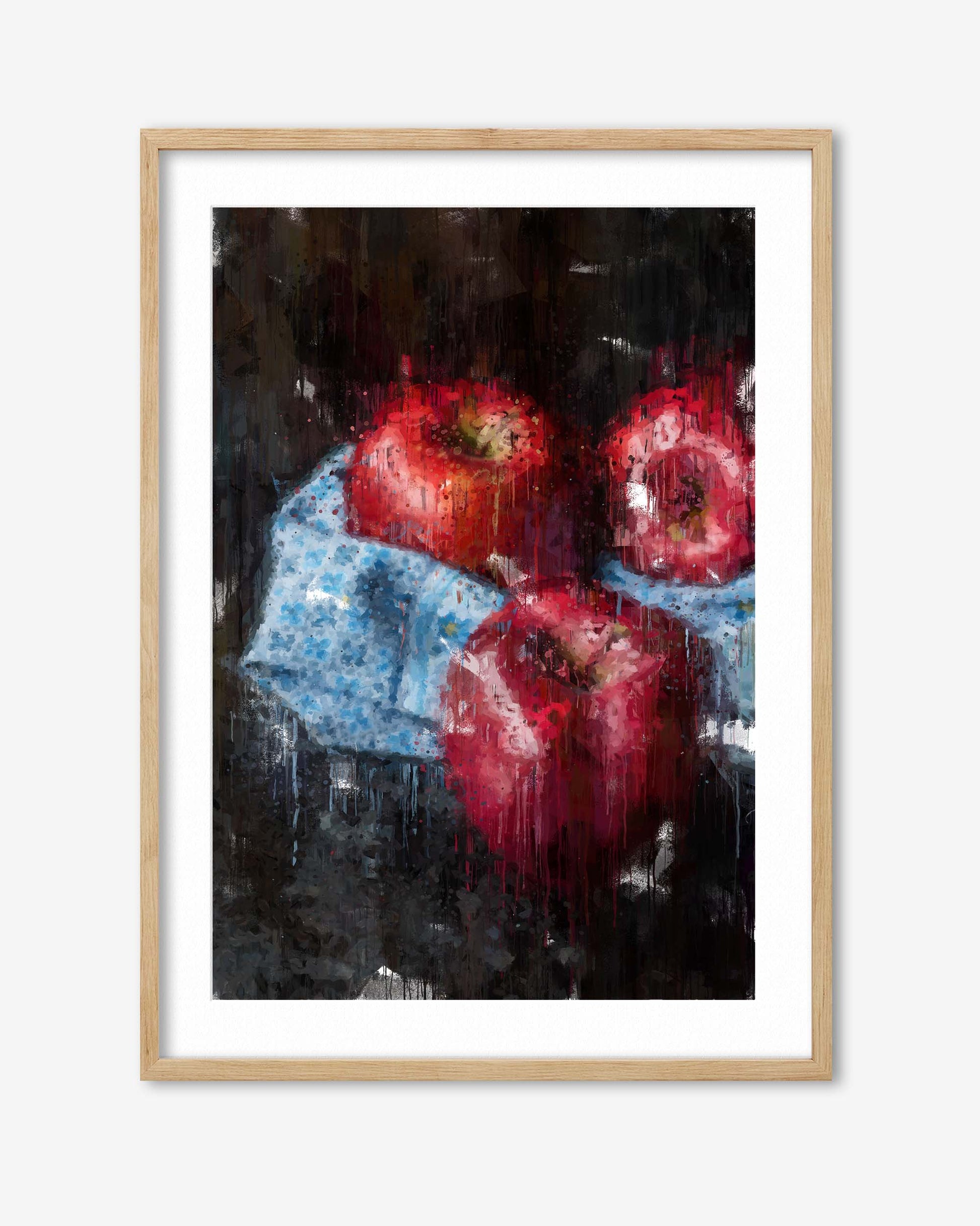 Framed artwork of three red apples on a dark background