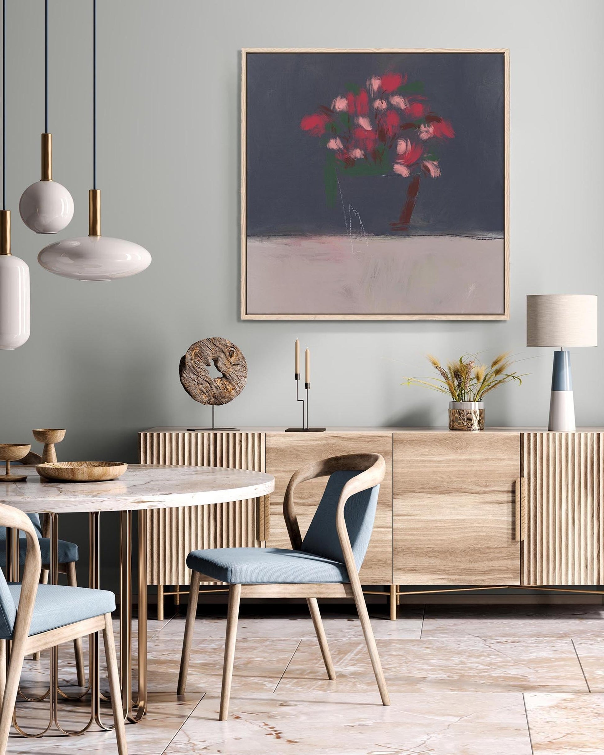 Modern dining room with wooden table, chairs, and a painting on the wall.