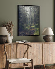 impressionist painting of nature forest above a sideboard