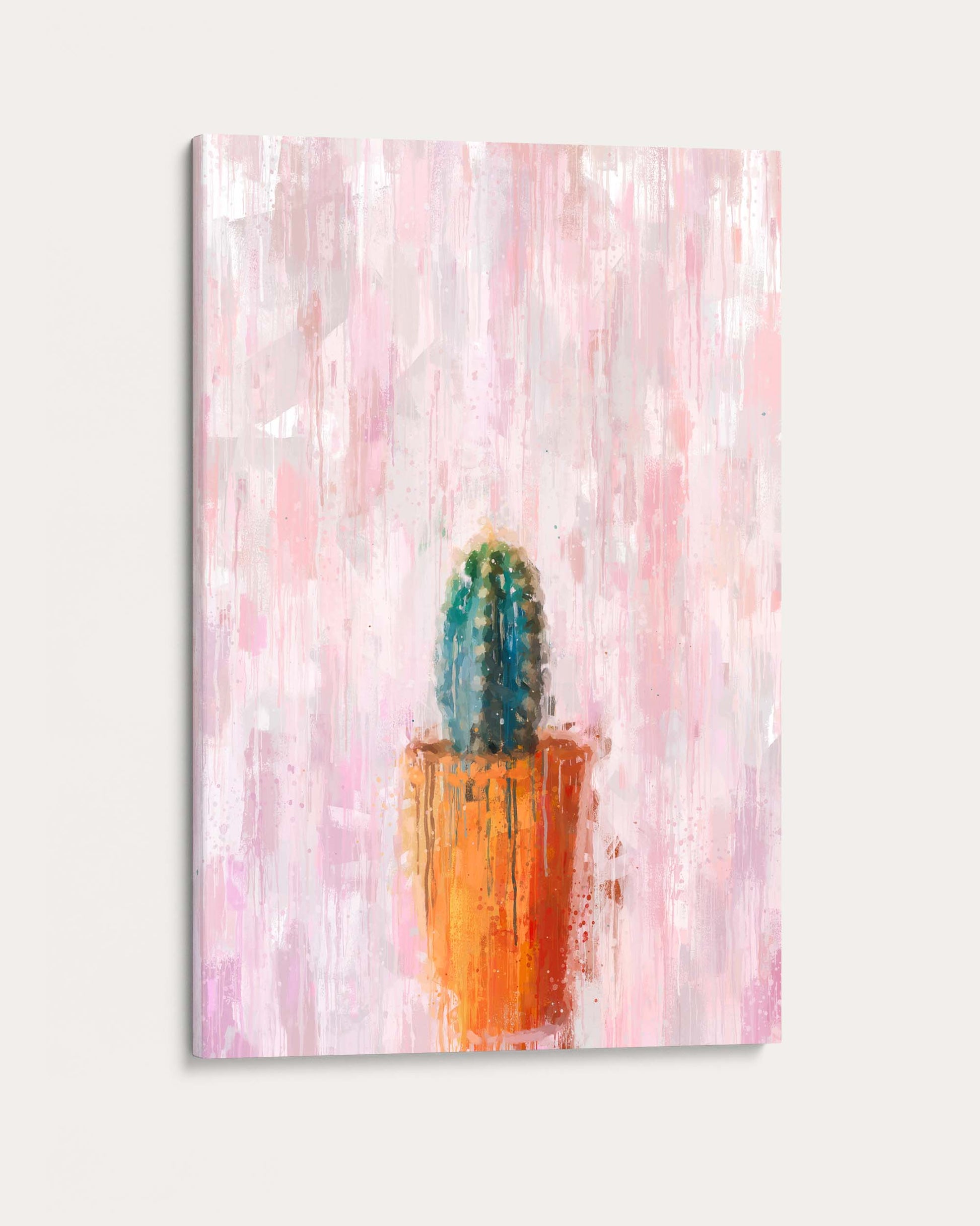 Canvas print with a cactus painting on a pink and orange abstract background