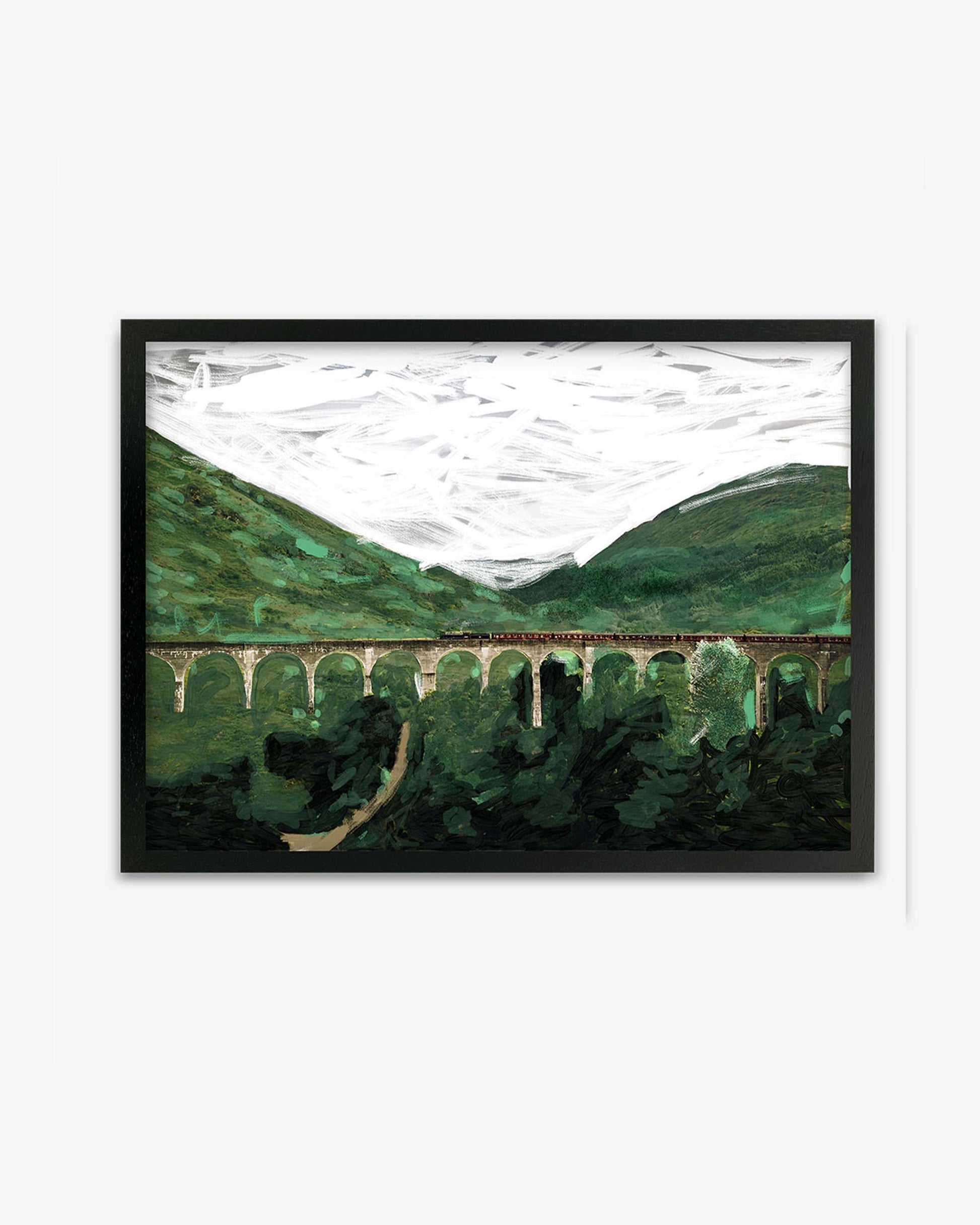 A framed print depicting a bridge spanning a valley with mountains in the background, primarily in shades of green and white.