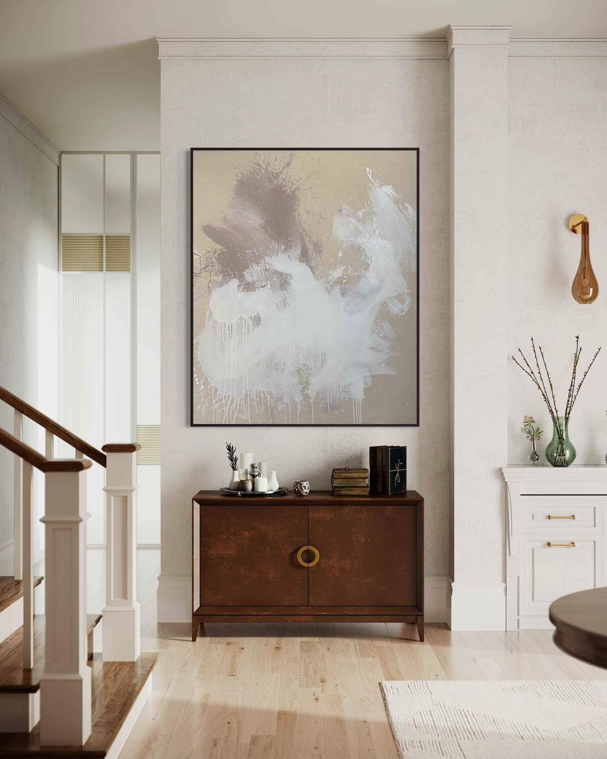 Modern interior with abstract art, wooden cabinet, and decorative items.