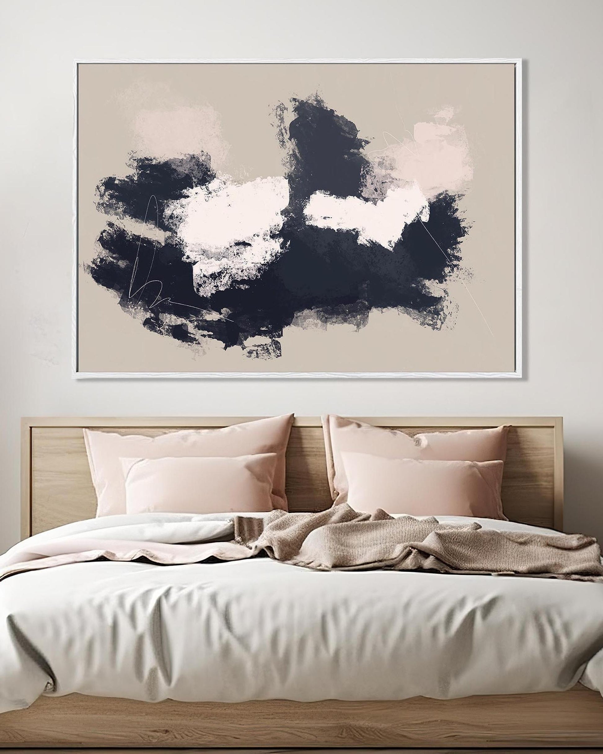 Bedroom with abstract wall art above the bed