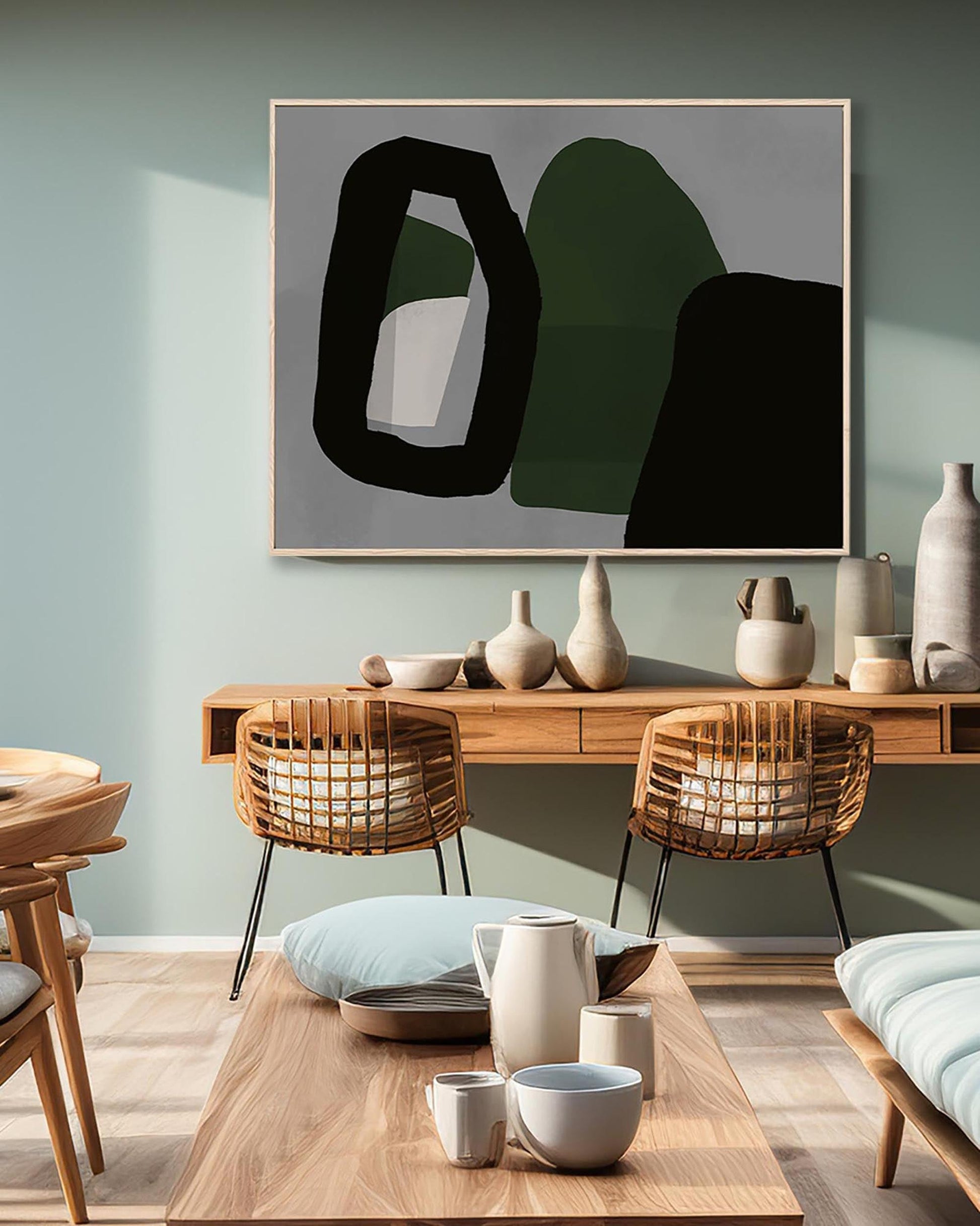 Modern dining room with abstract art on the wall and wooden furniture.