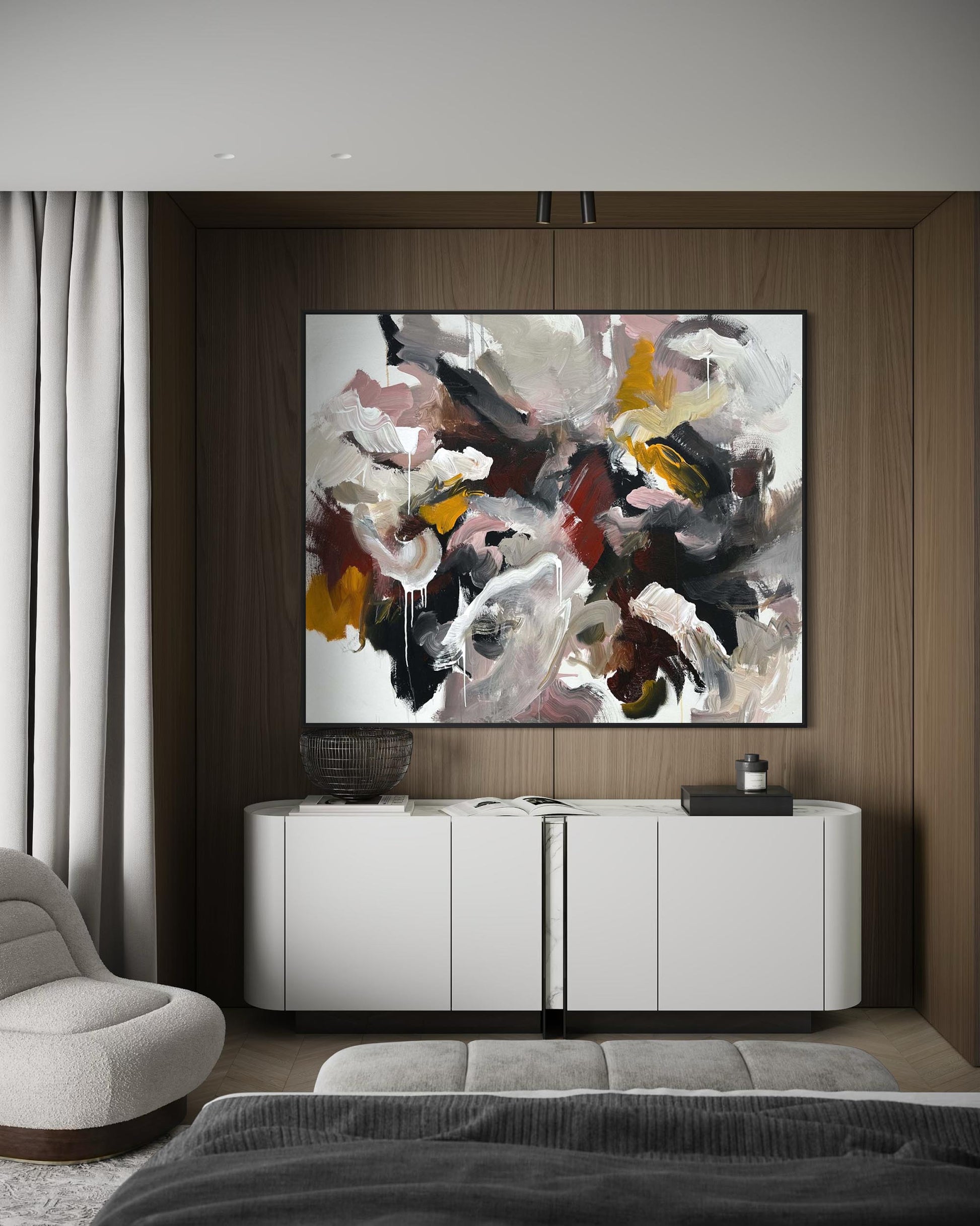 Abstract painting on a wall above a white cabinet in a modern living room.