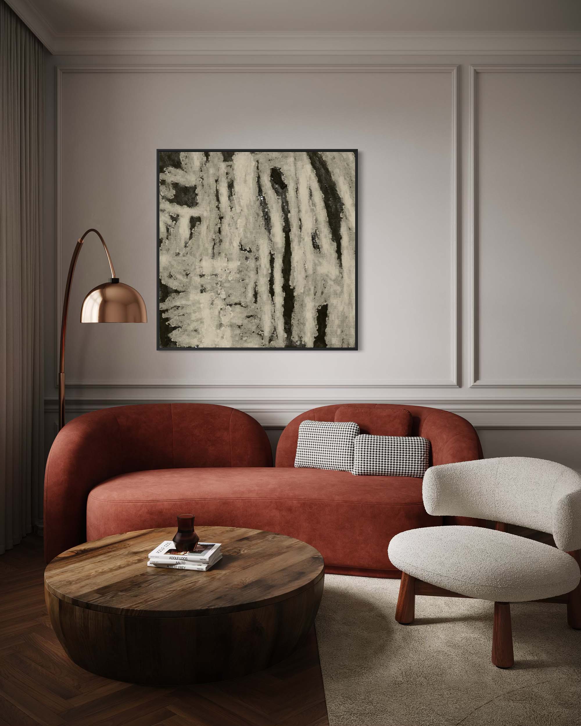 Modern living room with a red sofa, wooden coffee table, and abstract art on the wall.