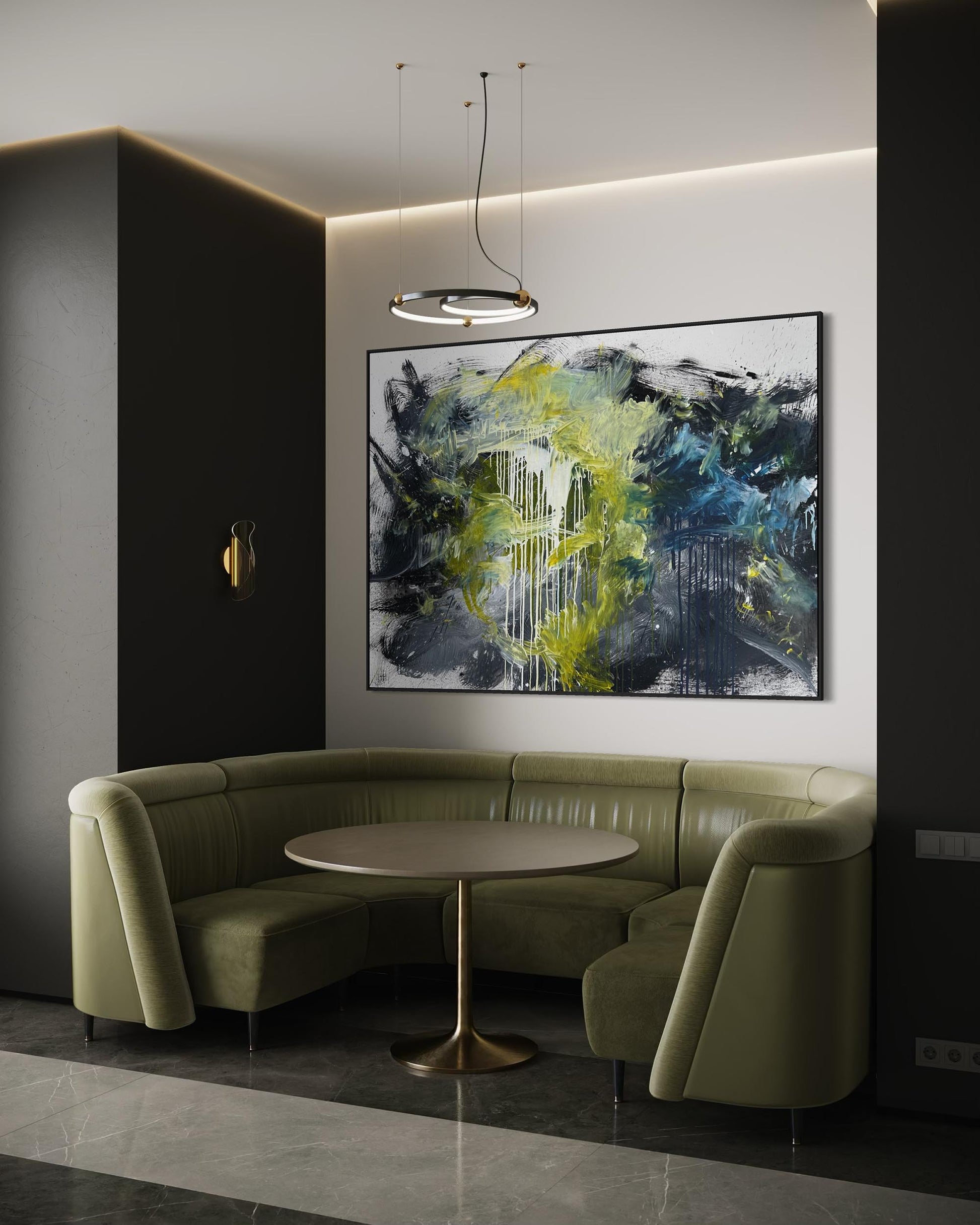 Modern interior with a green sofa, round table, and abstract painting on the wall.